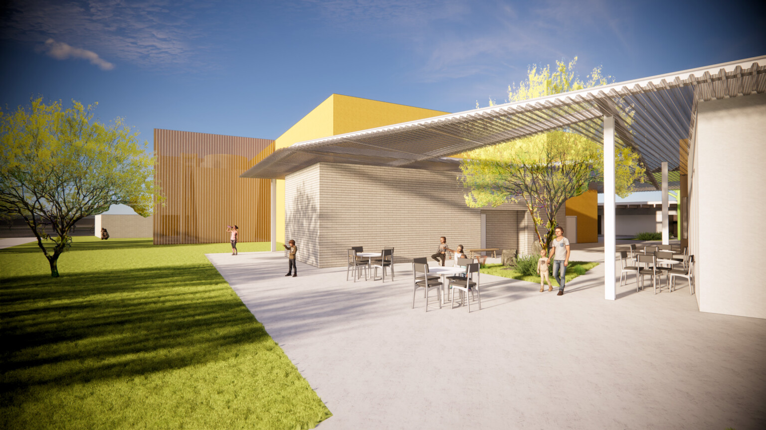 architectural rendering; Young students and parents walking through a sunny courtyard connecting to a green lawn. Between the two building volumes, people sit at café chairs and tables under an awning.