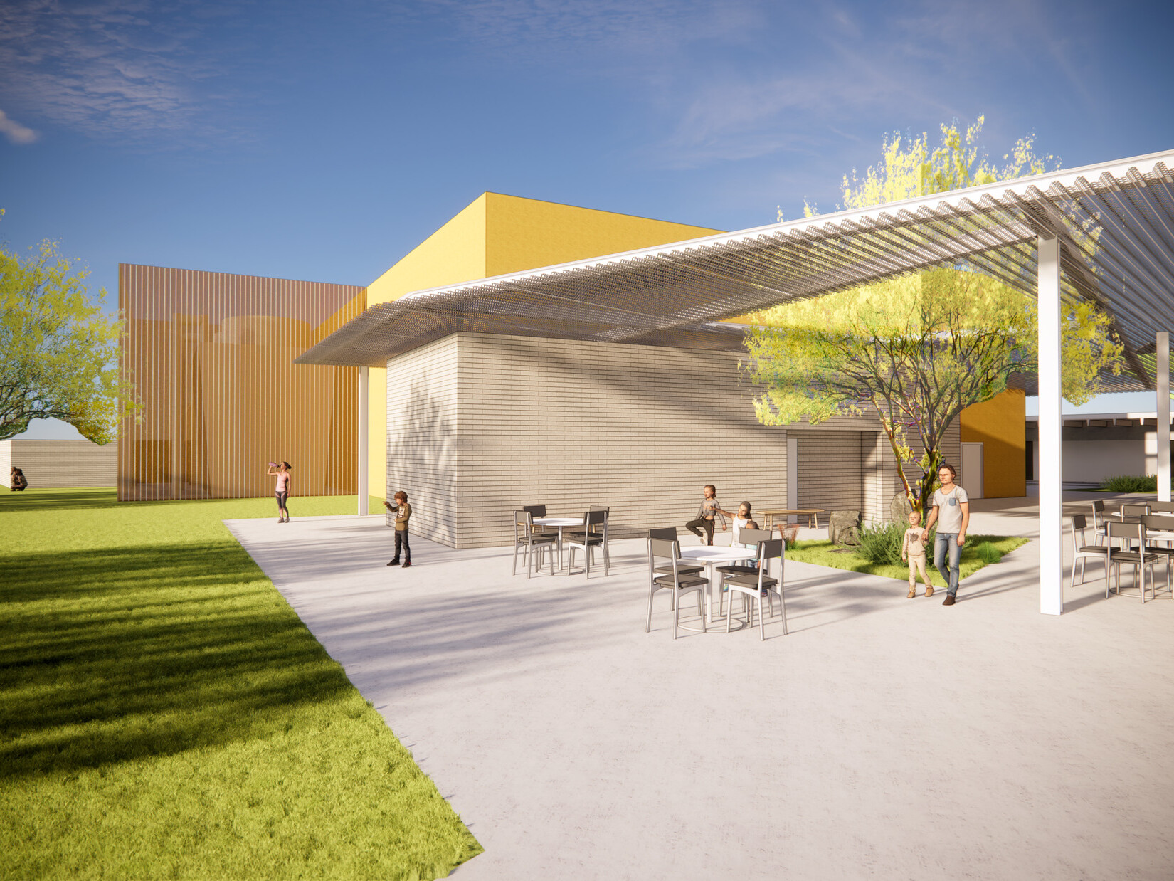 architectural rendering; Young students and parents walking through a sunny courtyard connecting to a green lawn. Between the two building volumes, people sit at café chairs and tables under an awning.