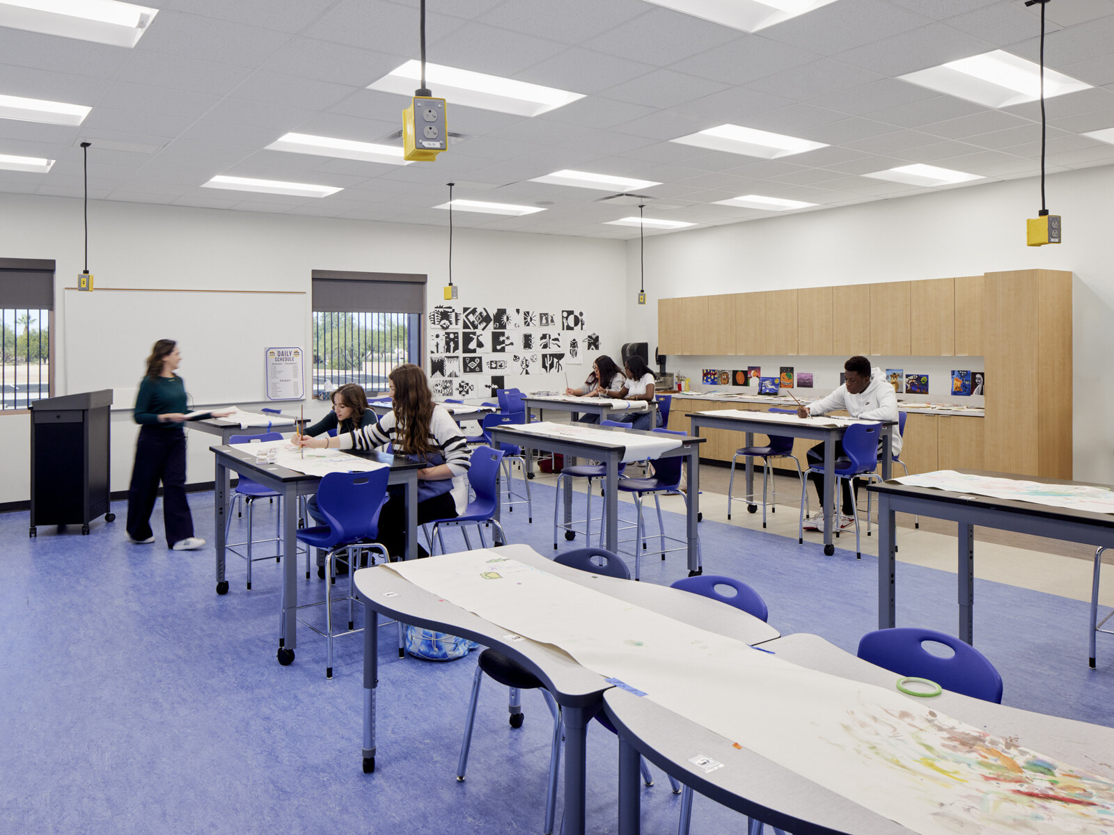 classroom in Marana Vista Academy with blue and gray 4-person tables; open concept
