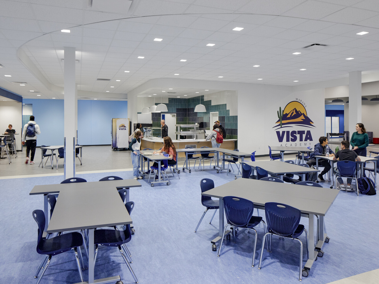 classroom in Marana Vista Academy with blue and gray 4-person tables; open concept