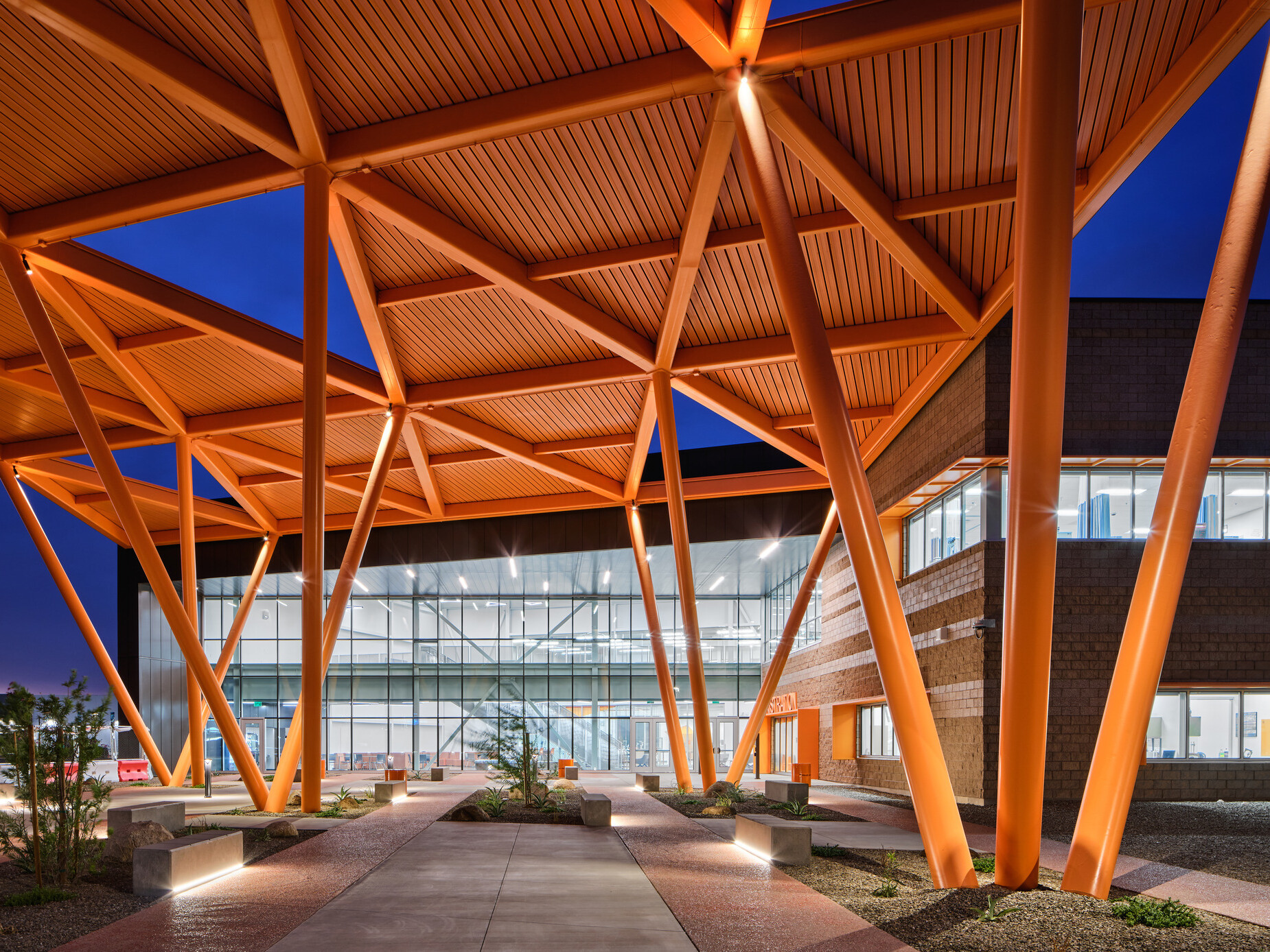 orange framing welcomes students in a large open entryway