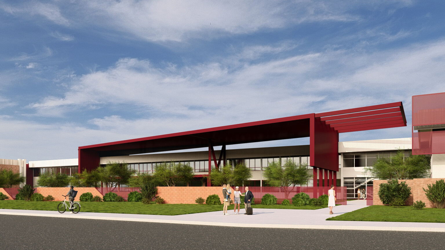 PXU career technical high school; school renovation and modernization in Phoenix for Metro Tech; large shading in branded red covers the outdoor area for passive cooling