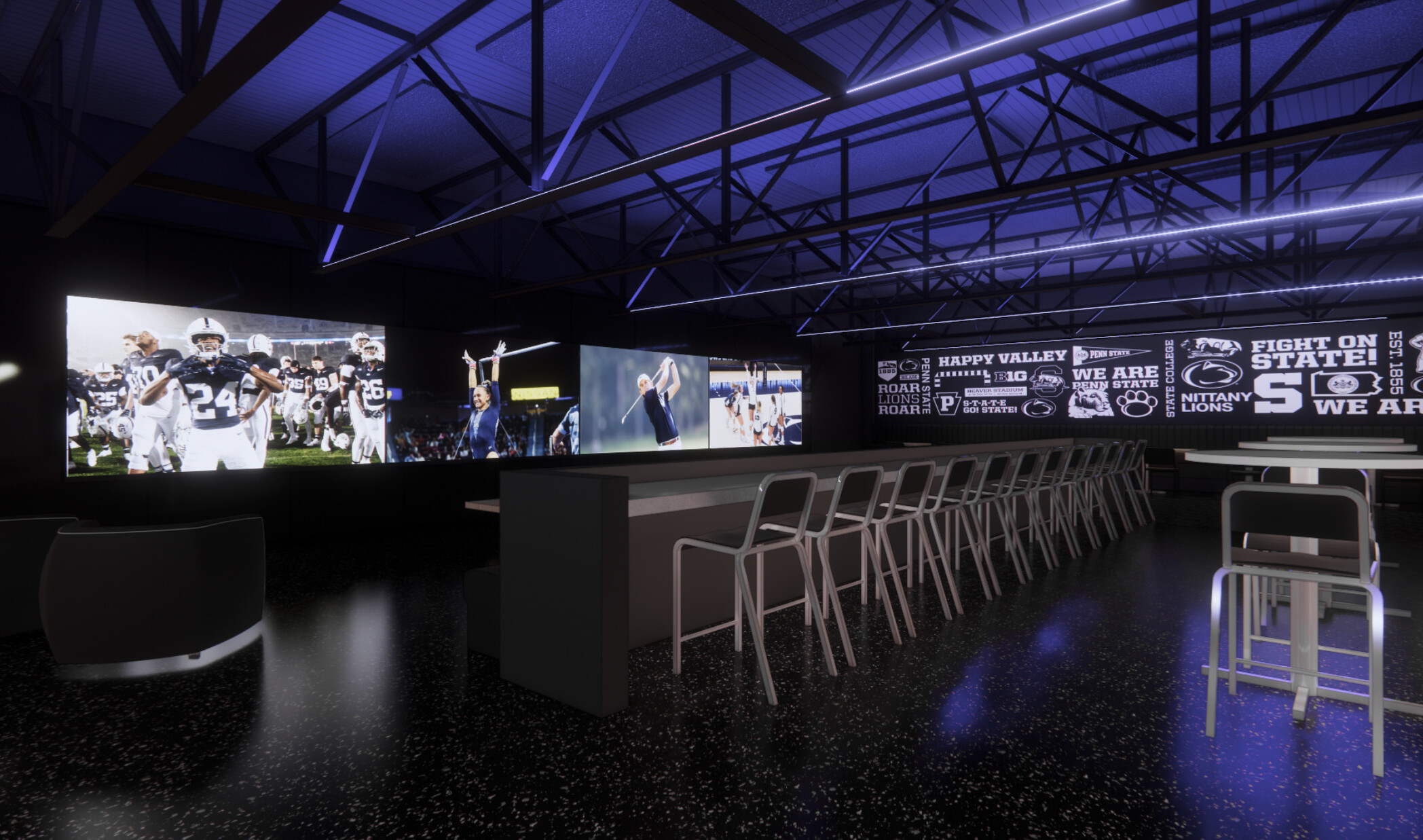 Penn State’s Greenberg Indoor Sports Complex lounge space; dimly lit room with blue carpets and black varied leather seating; large screens lining the walls of the space