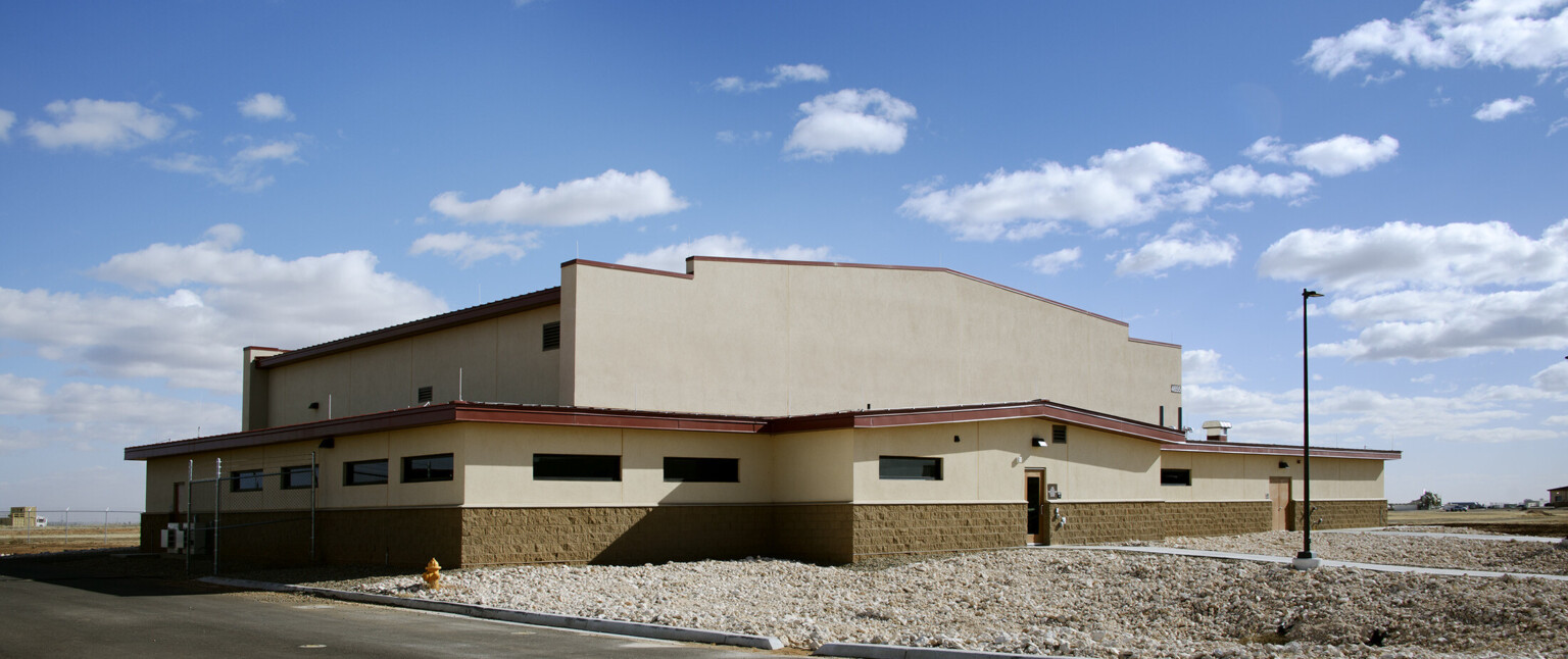 The Cannon Air Force Base Squadron Operations Facility uses mission-style architecture to meld seamlessly with the surrounding high plains and blue skies of eastern New Mexico