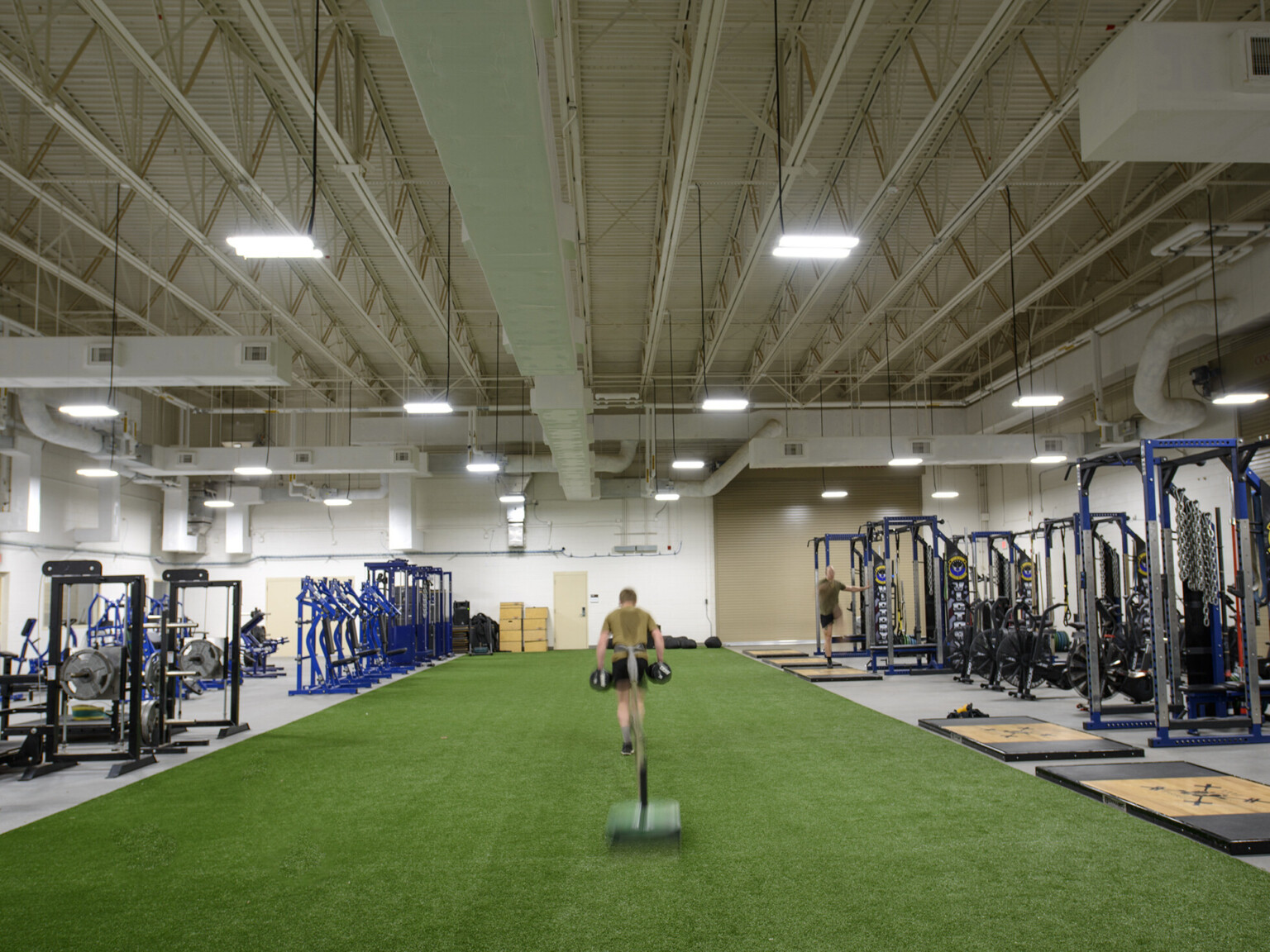 The Human Performance Training Center includes a double-high training space, state of the art weight equipment, therapy areas, a classroom, and administrative offices