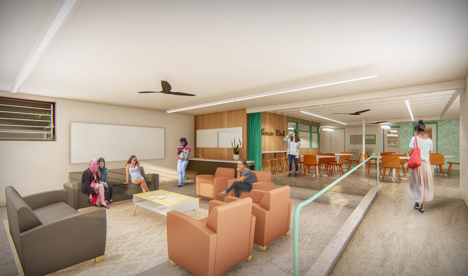 Step down living room with orange arm chairs and brown couches off of a dining room, partially separated by a green partition