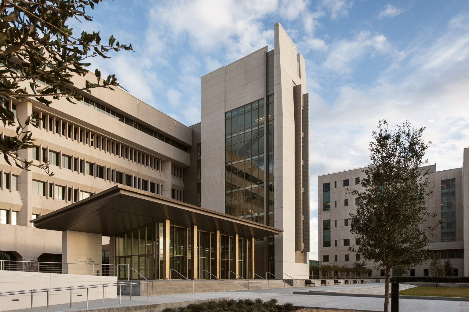 George C. Young Federal Building and U.S. Courthouse, concrete multistory building with glass and concrete tower George C. Young Federal Building and U.S. Courthouse, concrete multistory building with glass and concrete tower