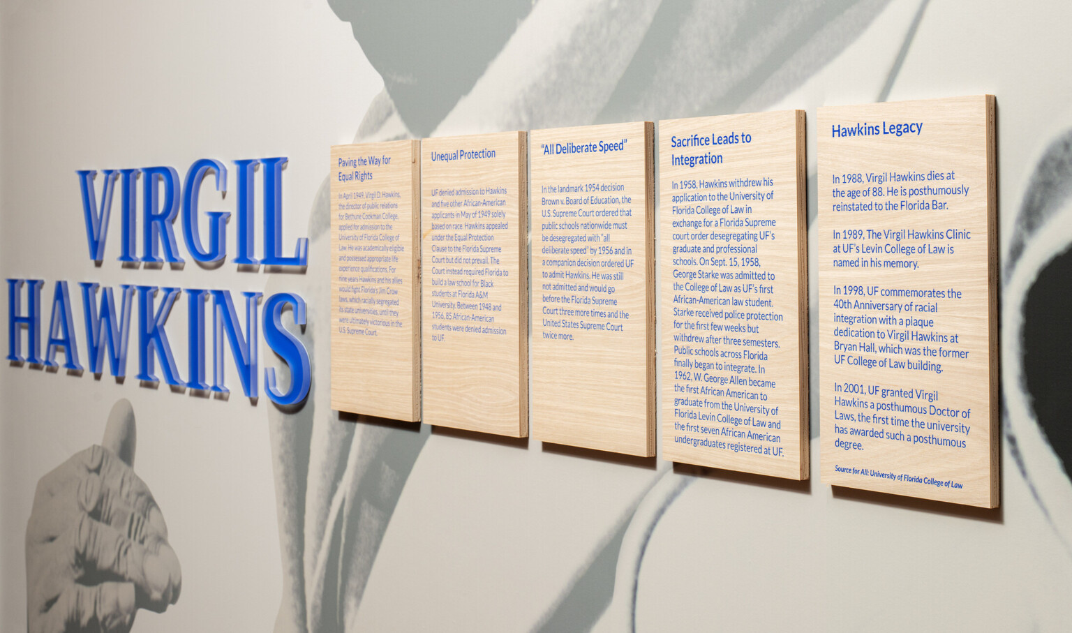 Close up of Virgil Hawkins name and information panels on wall