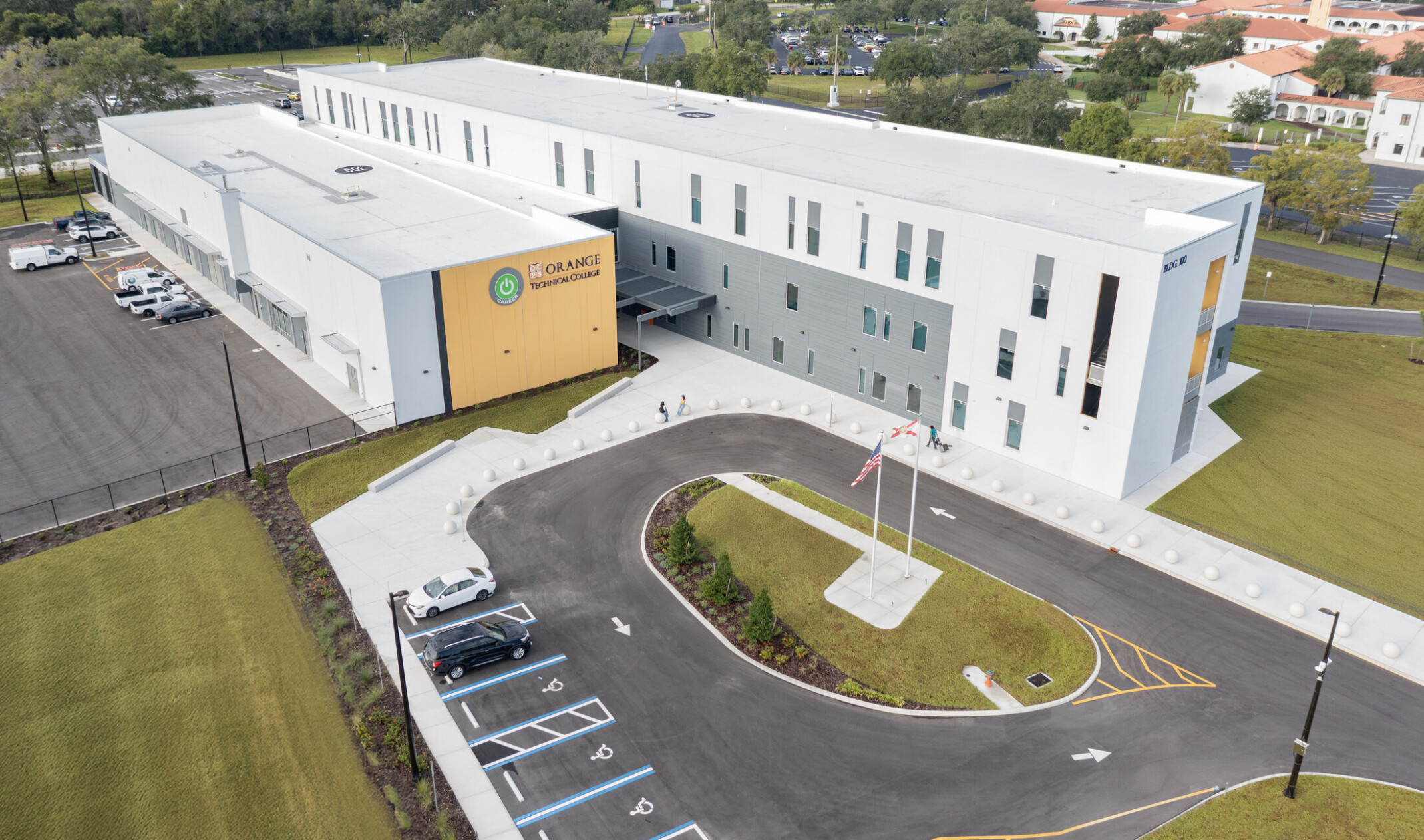 Exterior image of a modern two building campus building; creating an atrium entrance to the two spaces
