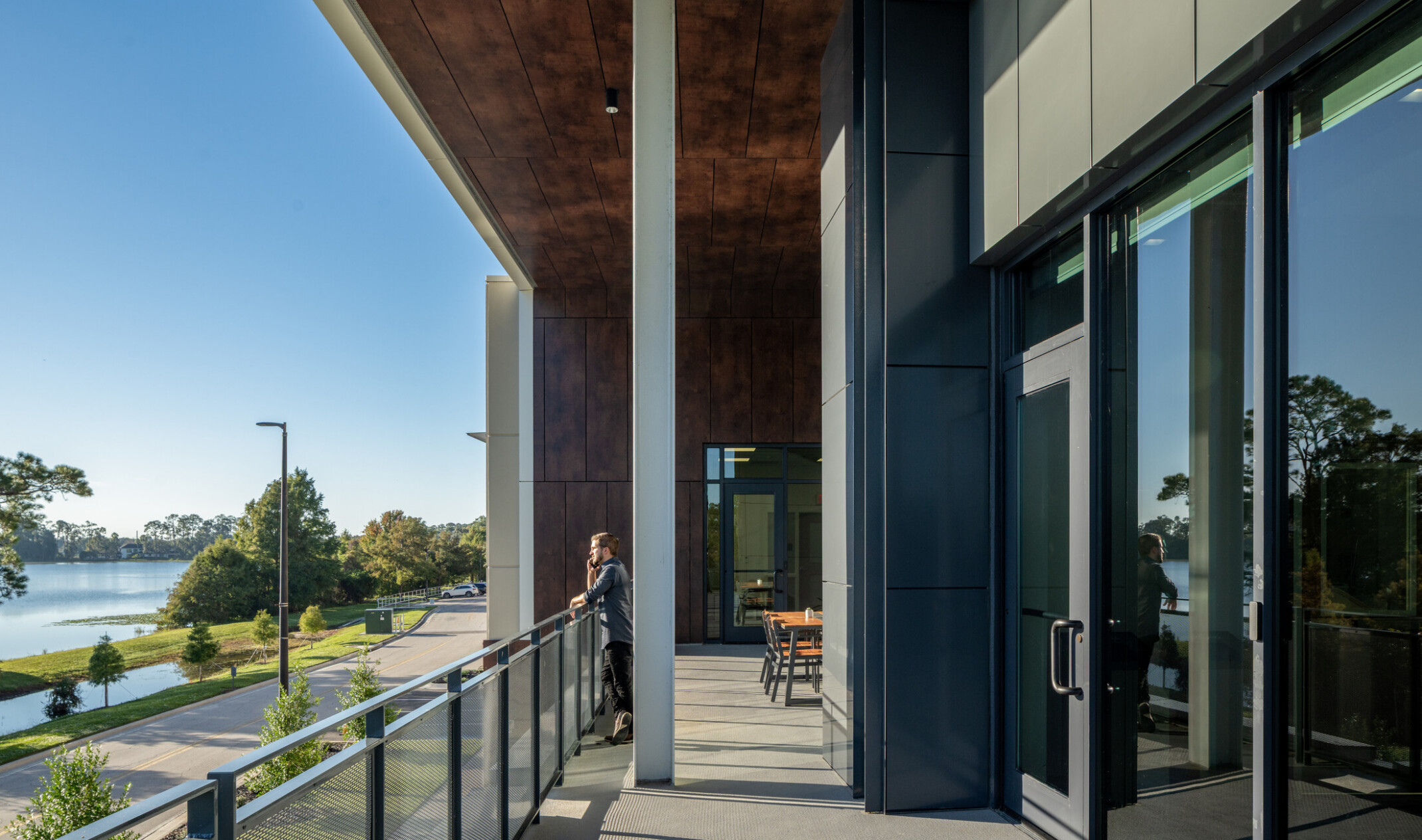 school hallway deck overlooking Lake Burkett with outdoor views and connections to nature
