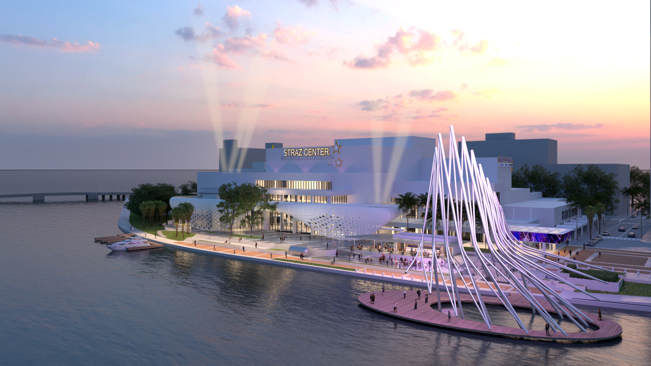 Front exterior rendering of the David A. Straz Jr. Center for the Performing Arts at night; modern white building overlooking the river; large white triangular feature above the dockside walking area