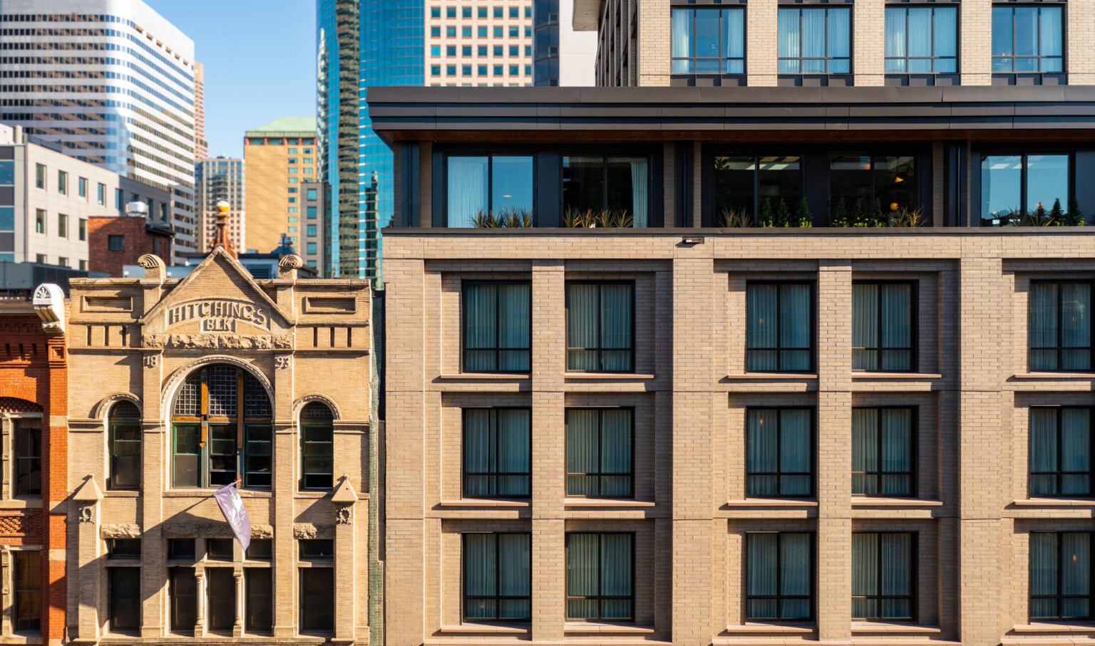 Detail of existing historical building blending into the Thompson Hotel Denver facade