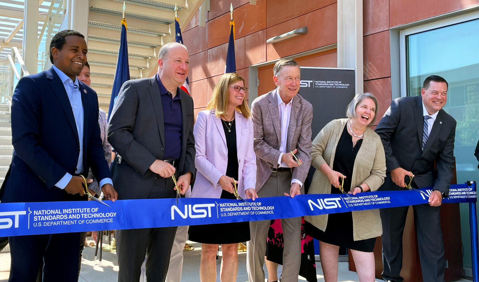 team cutting a ribbon National Institute of Standards and Technology Wing 5 Opens in Colorado; NIST Boulder