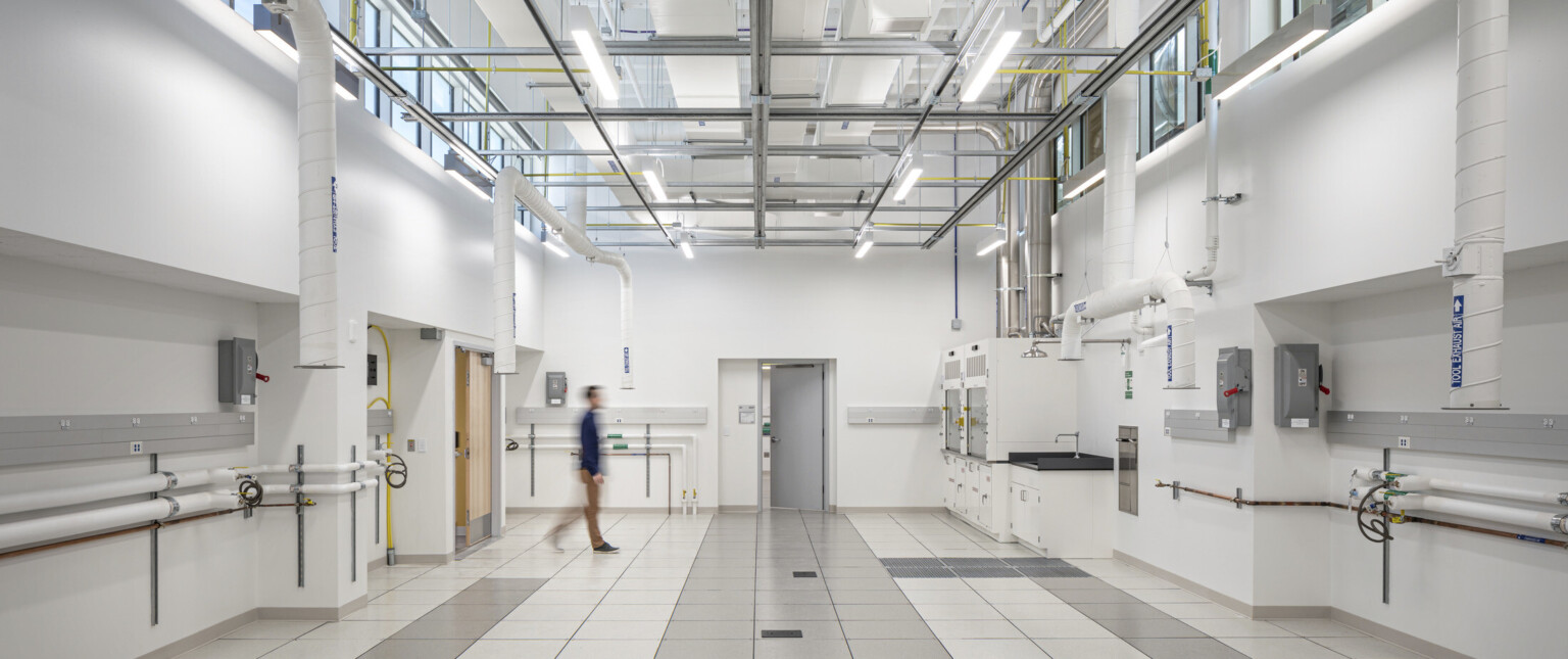 Crisp white clean lab space in National Institute of Standards and Technology overhead lighting and suport systems
