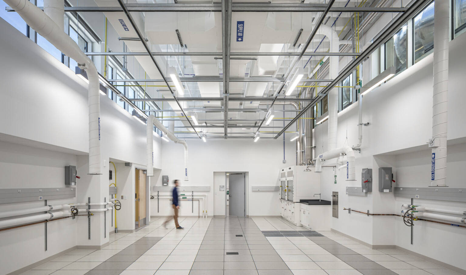 Crisp white clean lab space in National Institute of Standards and Technology overhead lighting and suport systems