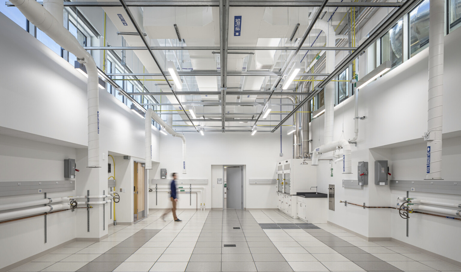 Crisp white clean lab space in National Institute of Standards and Technology overhead lighting and suport systems
