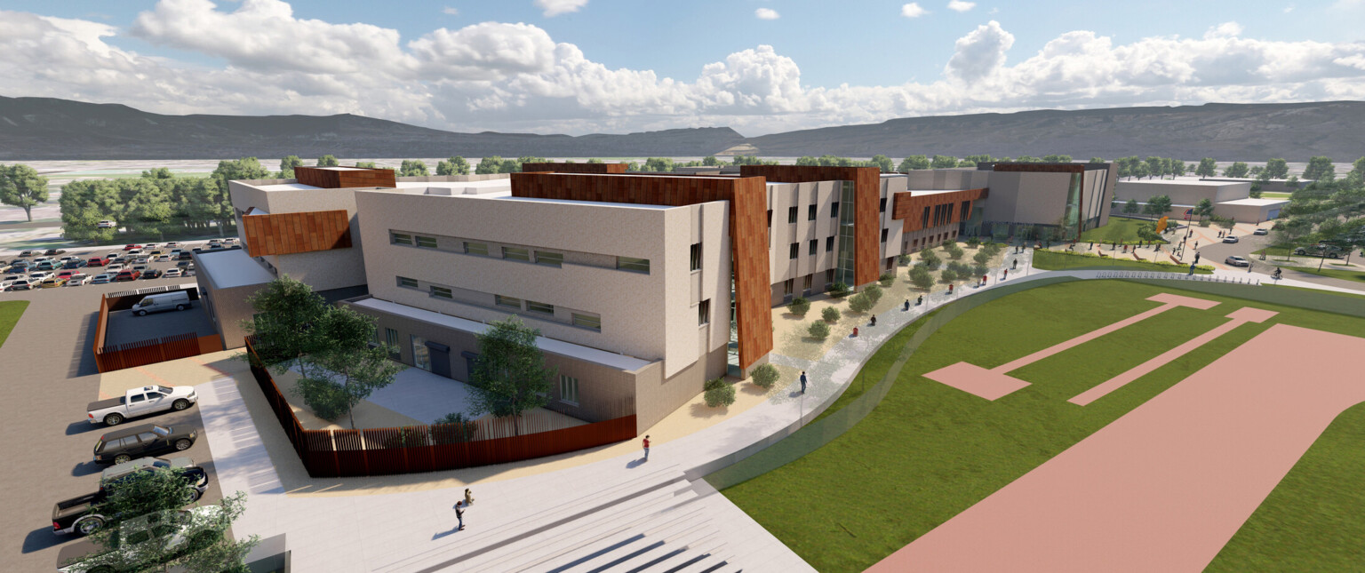 Aerial view design rendering of campus grounds, mass-timber and brick façade, large windows, signage, green space, trees, people on pathway, blue skies, parking lot