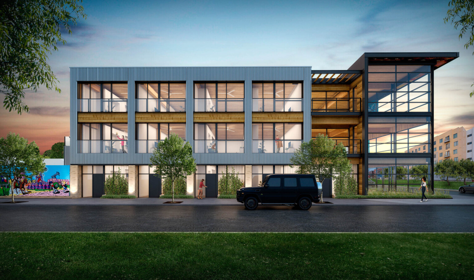 Side view of building with black exposed steel at front, white ribbed panel, back, exposed mass timber and large windows, greenery Side view of building with black exposed steel at front, white ribbed panel, back, exposed mass timber and large windows, greenery