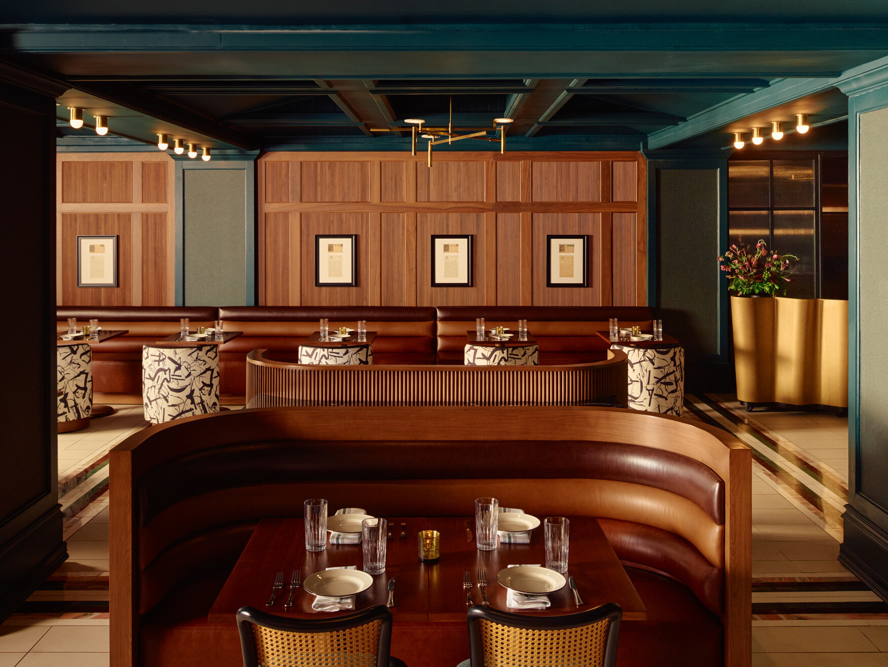 Jots restaurant at the Gunter Hotel, with a tawny leather booths and banquettes beneath inkwell-blue walls and ceiling.