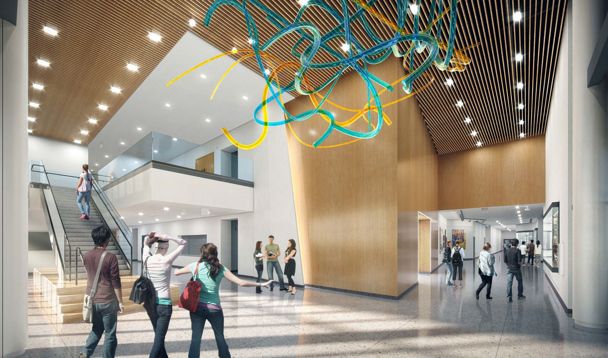 architectural rendering of students in a large hallway with artistic features and a large staircase