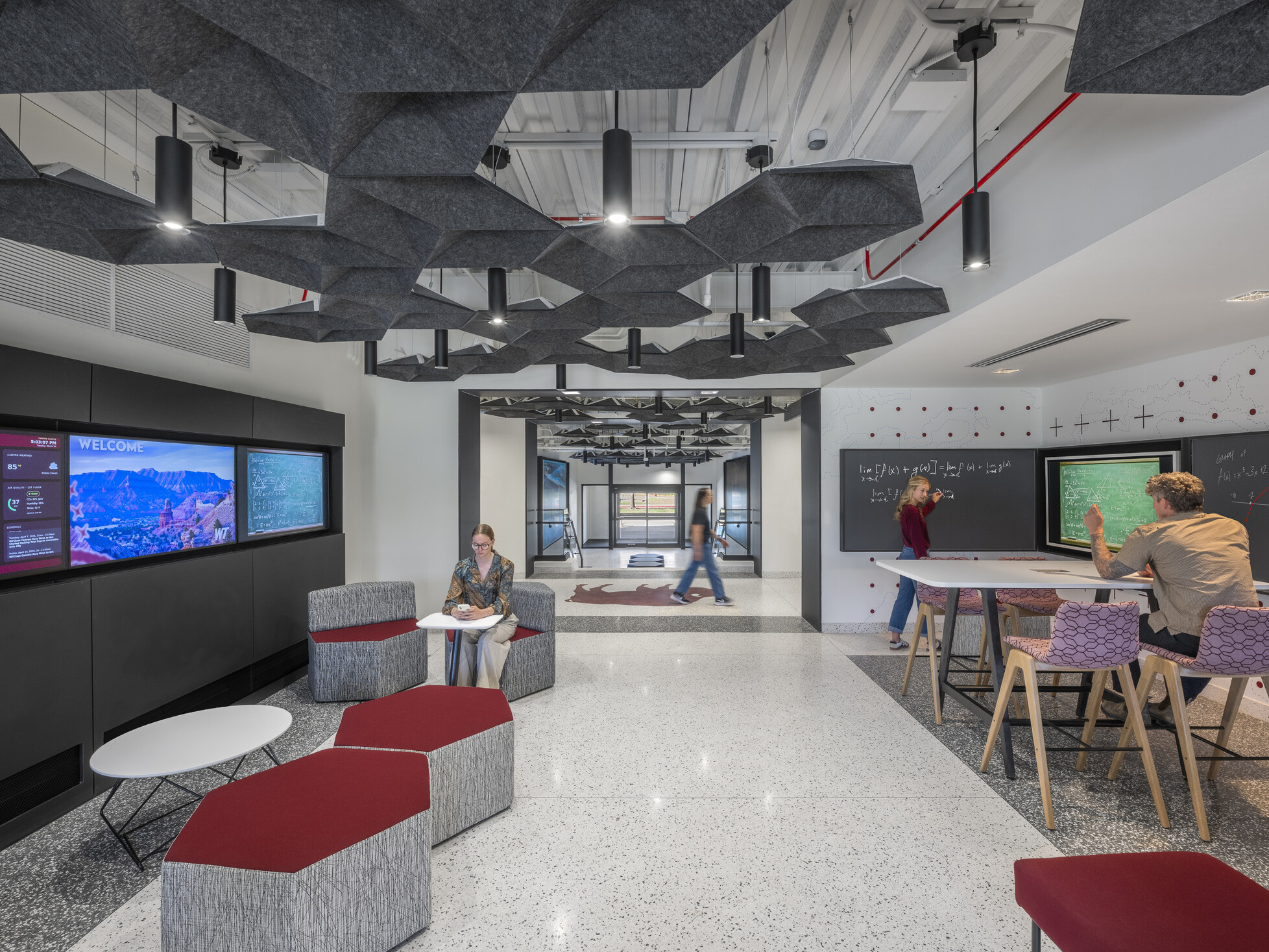 interior community space in a modern academic building; modular and built in furniture for learning