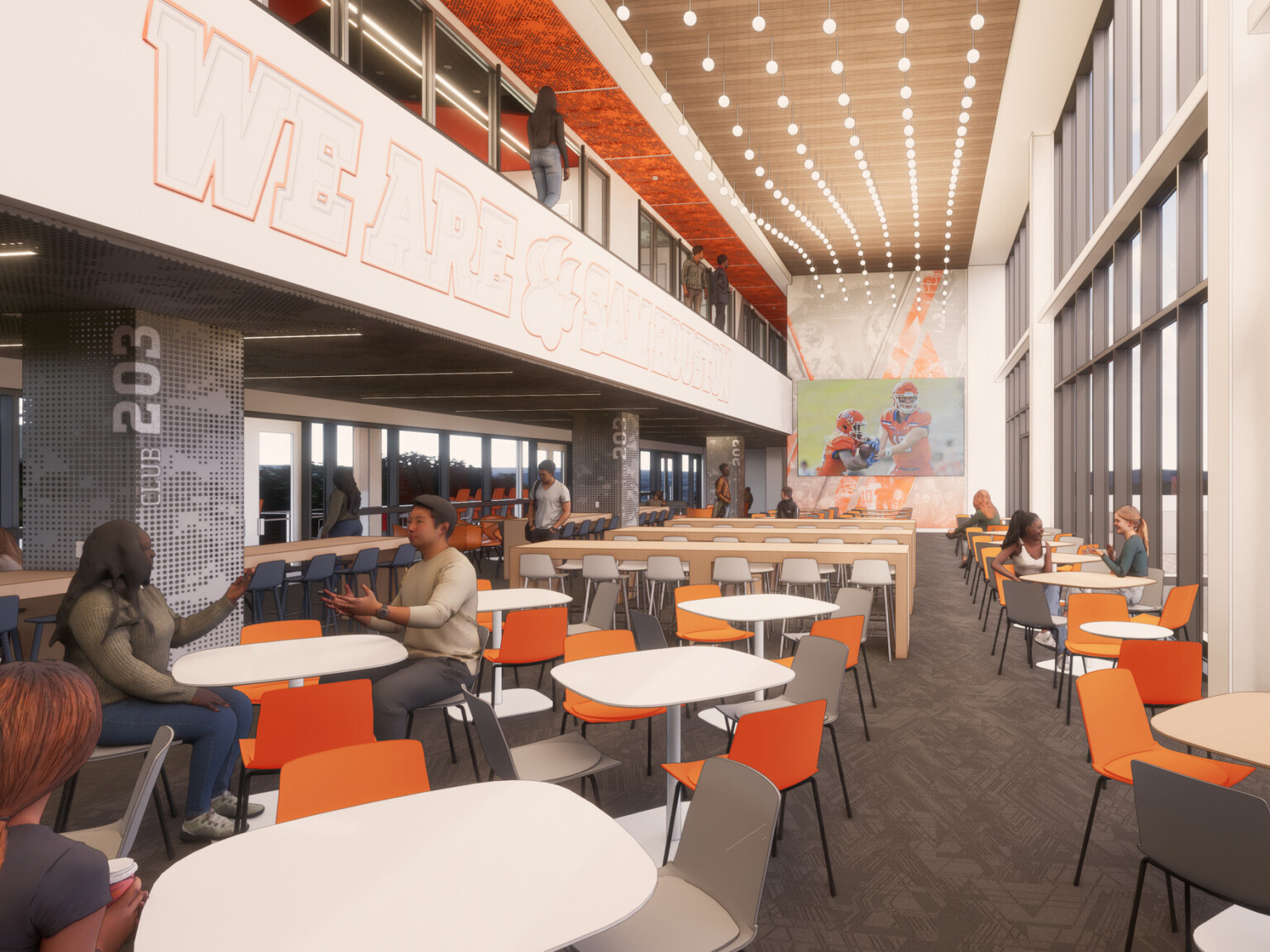 Spacious dining area with high ceilings, modern lighting, and orange and gray seating next to a wall of floor to ceiling windows