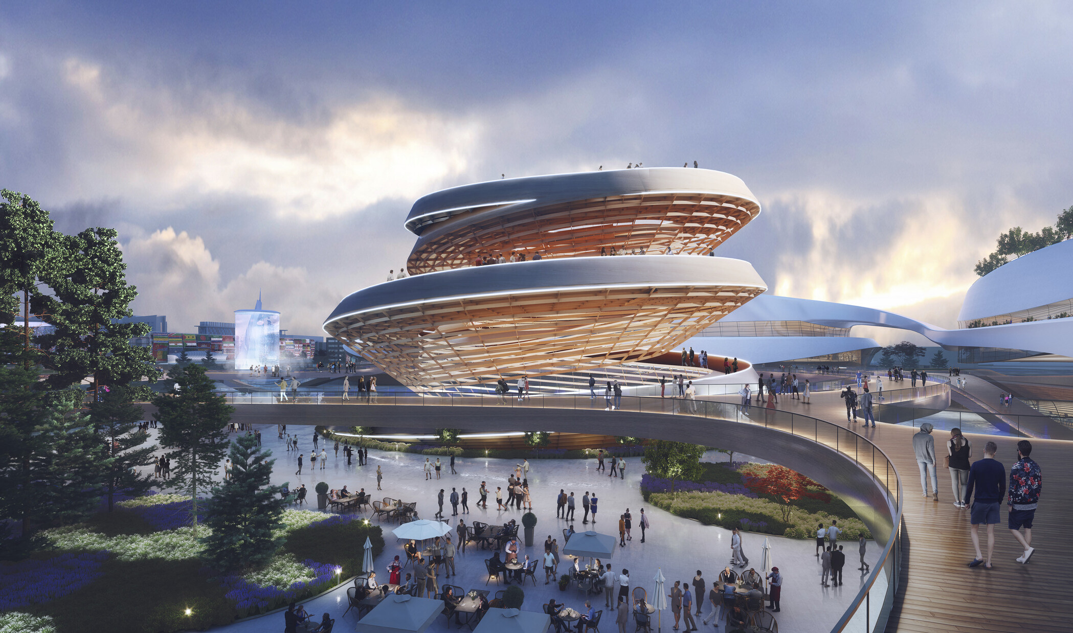 Rounded walkway to spiraling building with tan walls and white spiraling walkway to top