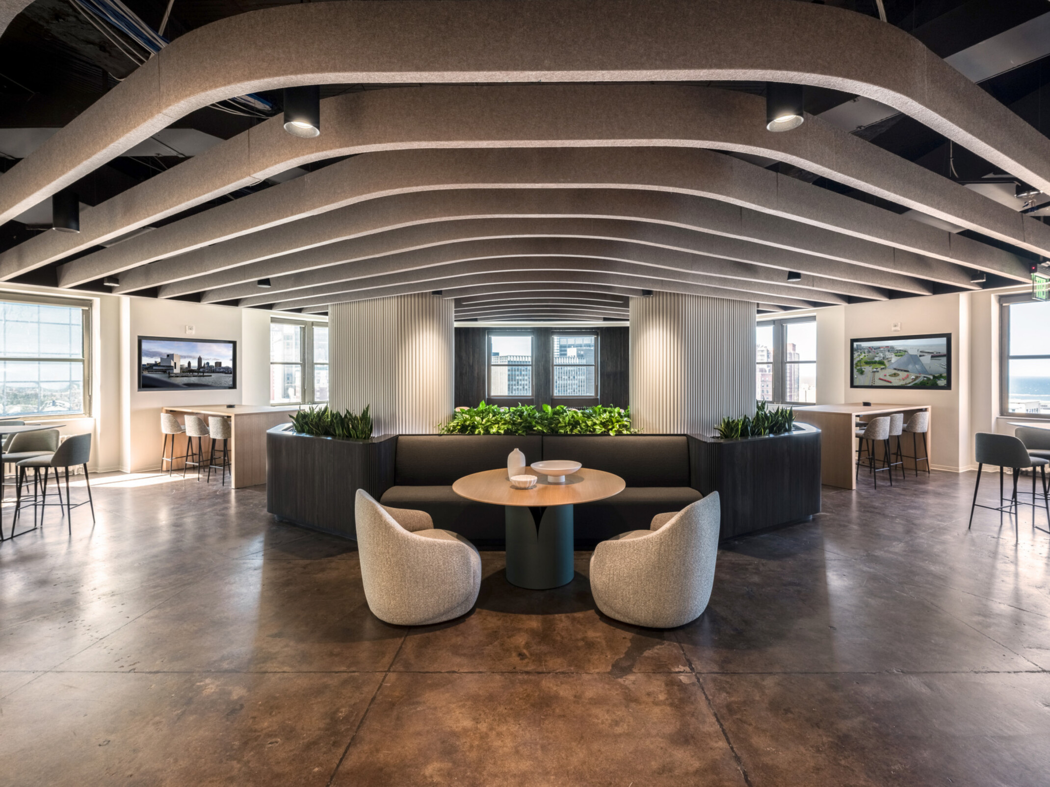 modern office central collaboration space with varied seating for eating and working; DLR Group Cleveland office