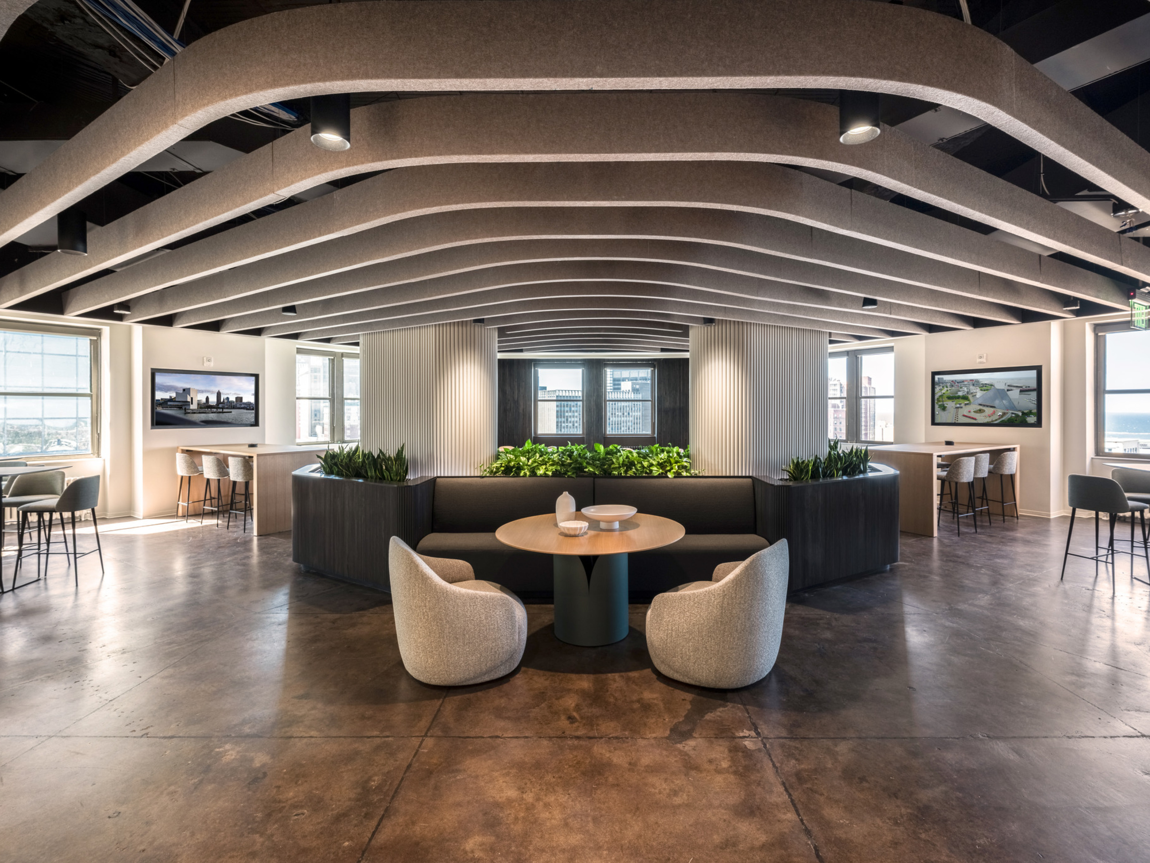 modern office central collaboration space with varied seating for eating and working; DLR Group Cleveland office
