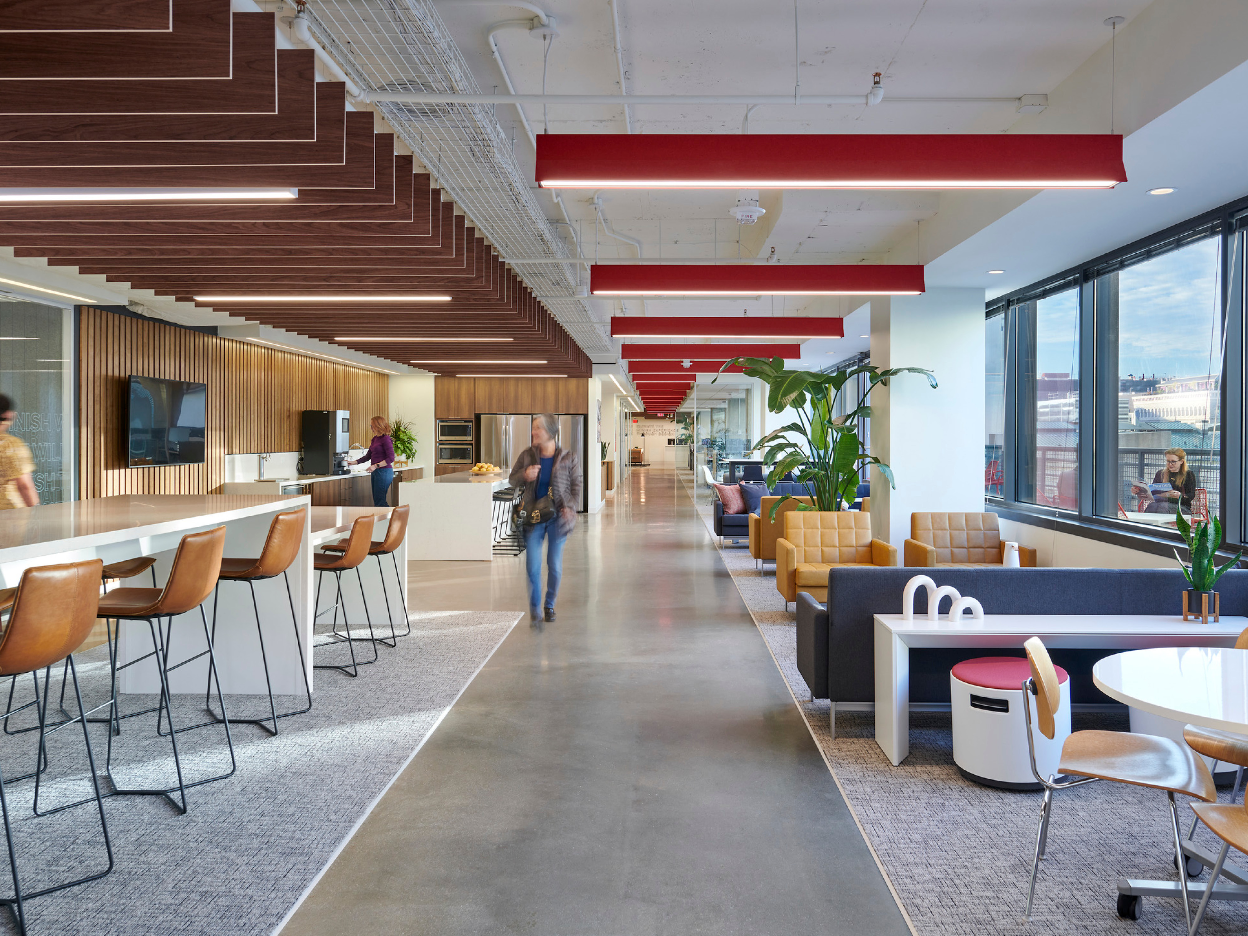 modern office of a major collaboration and gathering hub; modular and tabletop seating; DLR Group Washington, DC office