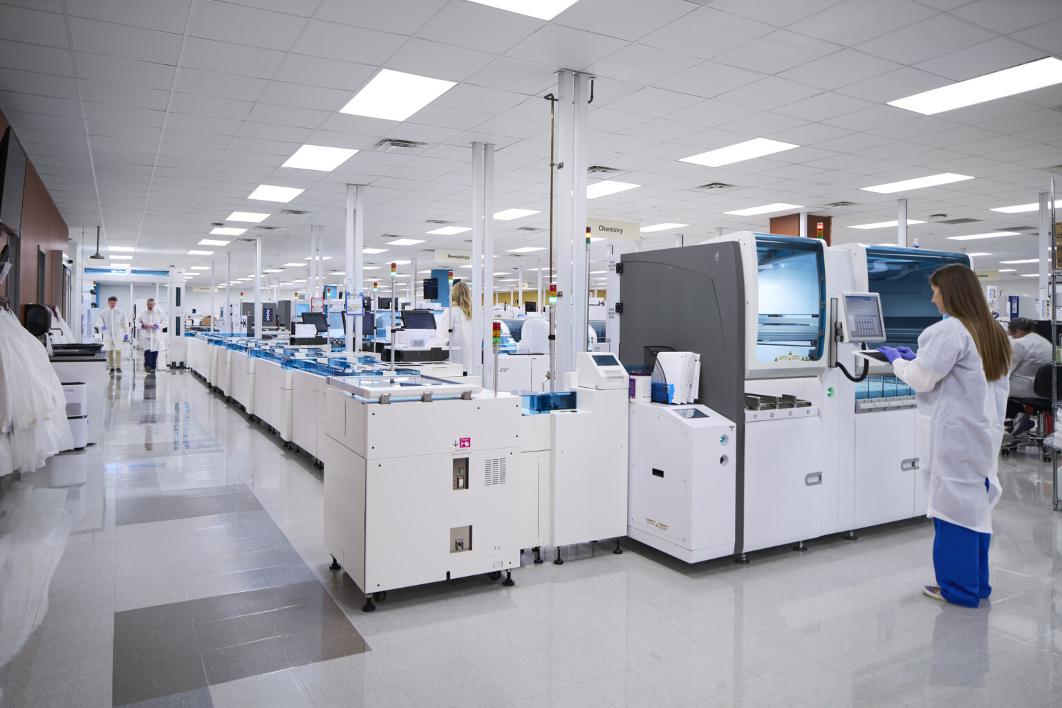 woman standing at an incubator at Vanderbilt university medical center; large state-of-the-art lab for medical teaching