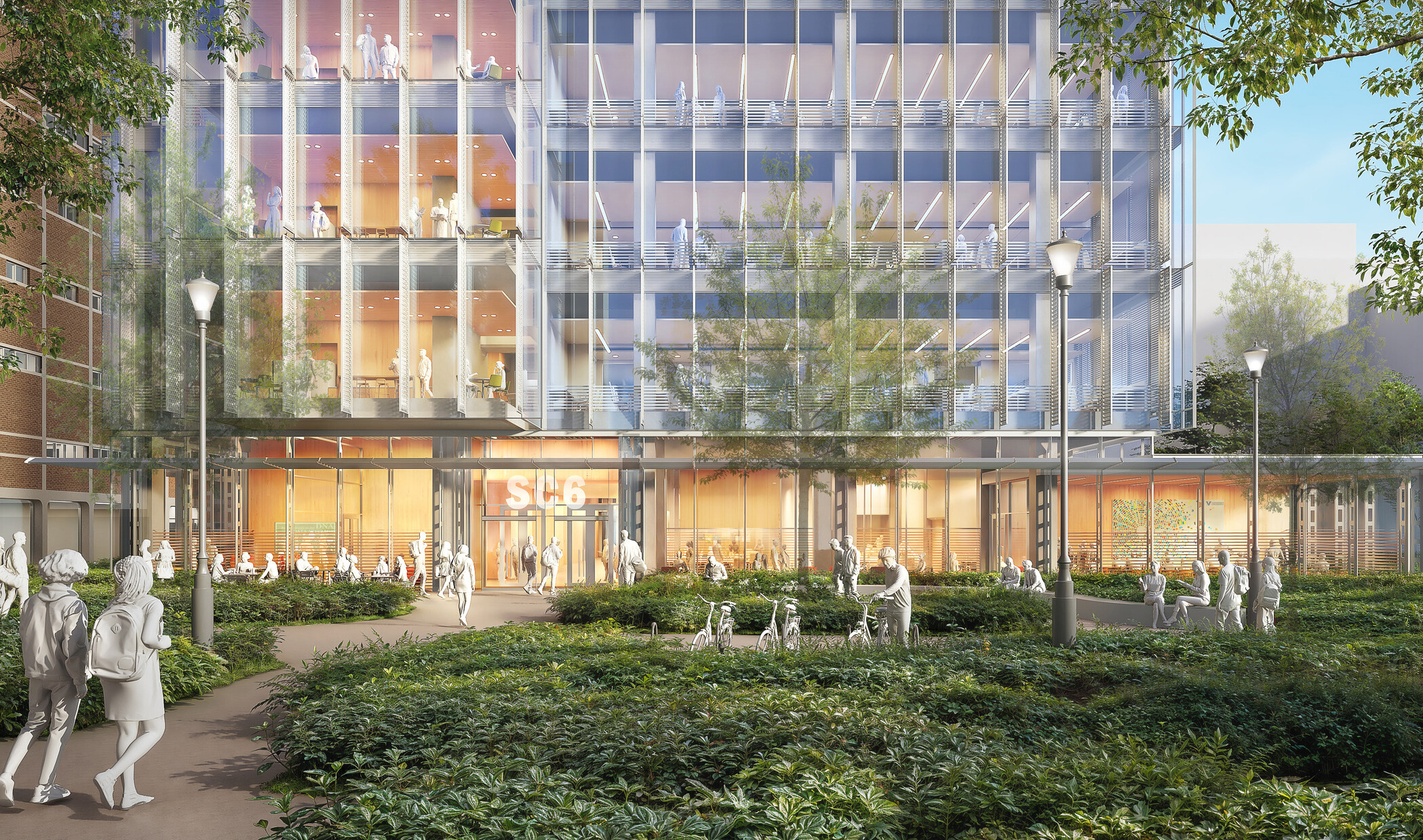 Design rendering of a campus glass, modern research facility; foreground courtyard and greenery space