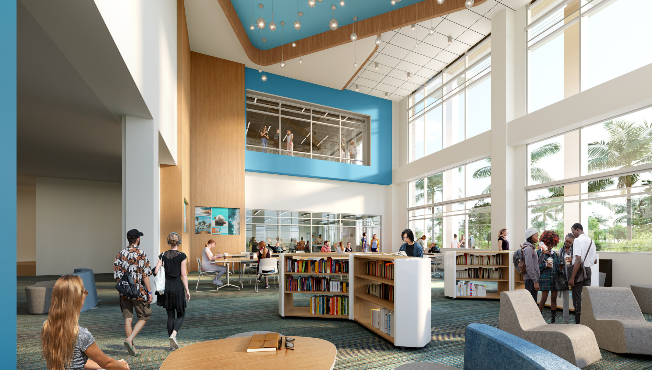interior of a modern high school; double height library; second floor look out onto small shelves and floor to ceiling windows for natural light