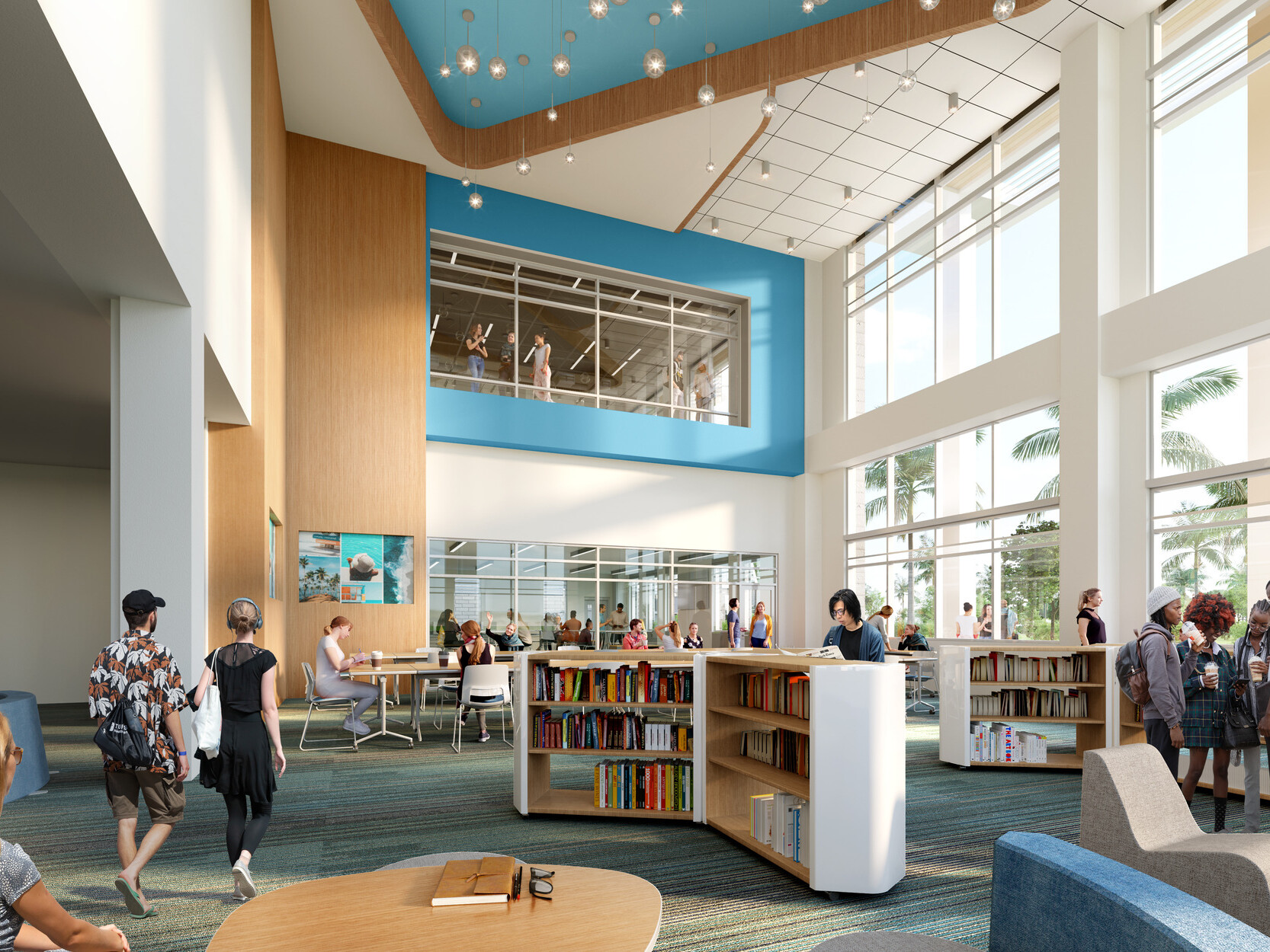 interior of a modern high school; double height library; second floor look out onto small shelves and floor to ceiling windows for natural light
