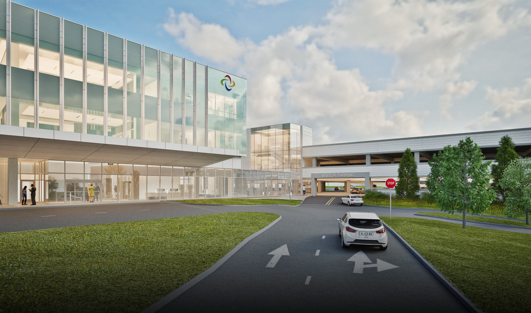 exterior architectural rendering of a modern medical cancer facility; lofted large glass building with floor to ceiling glass on the entry level