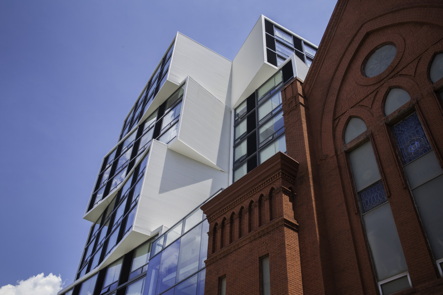 John and Jill Ker Conway Residence, modular white wrap angled serrated facade with large windows