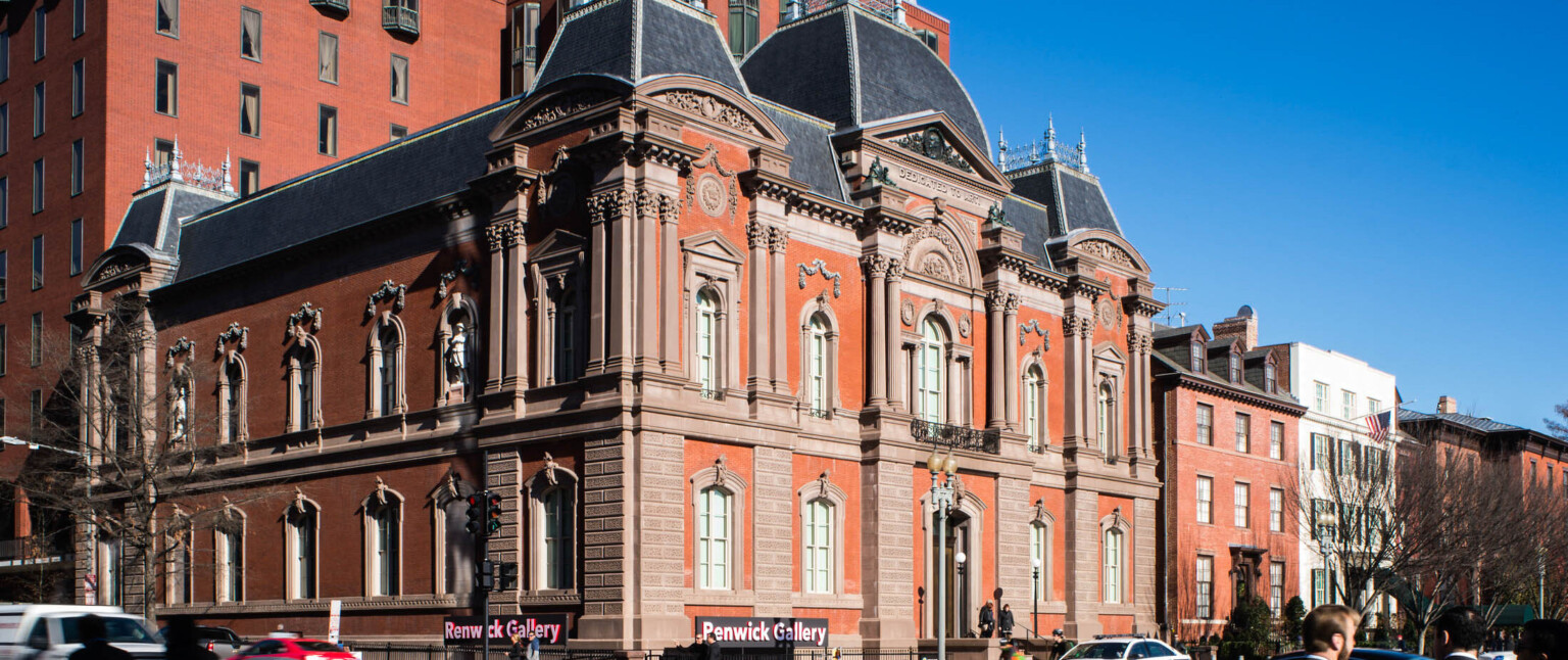 Exterior corner view of Smithsonian American Art Museum's Renwick Gallery from across a busy street