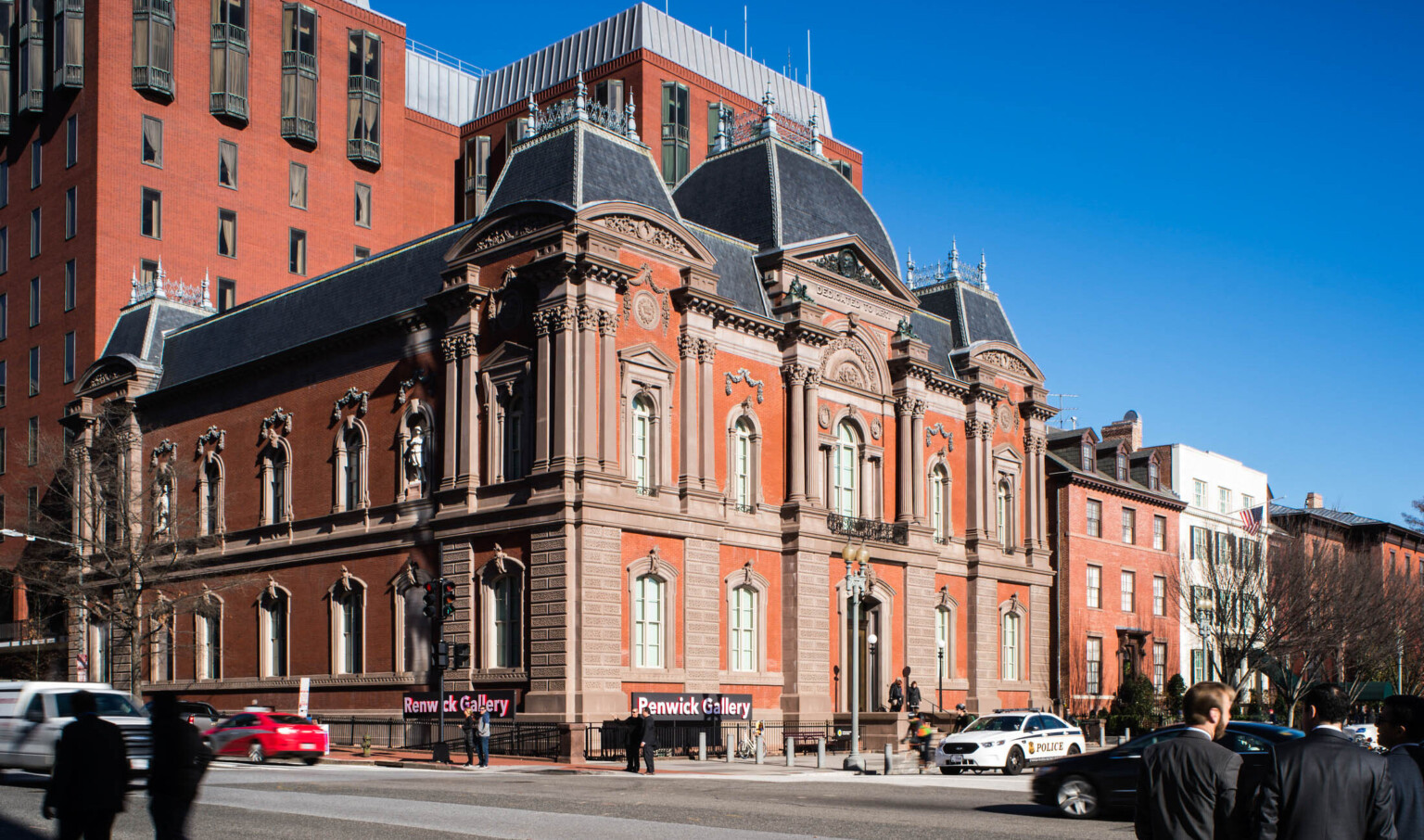 Exterior corner view of Smithsonian American Art Museum's Renwick Gallery from across a busy street