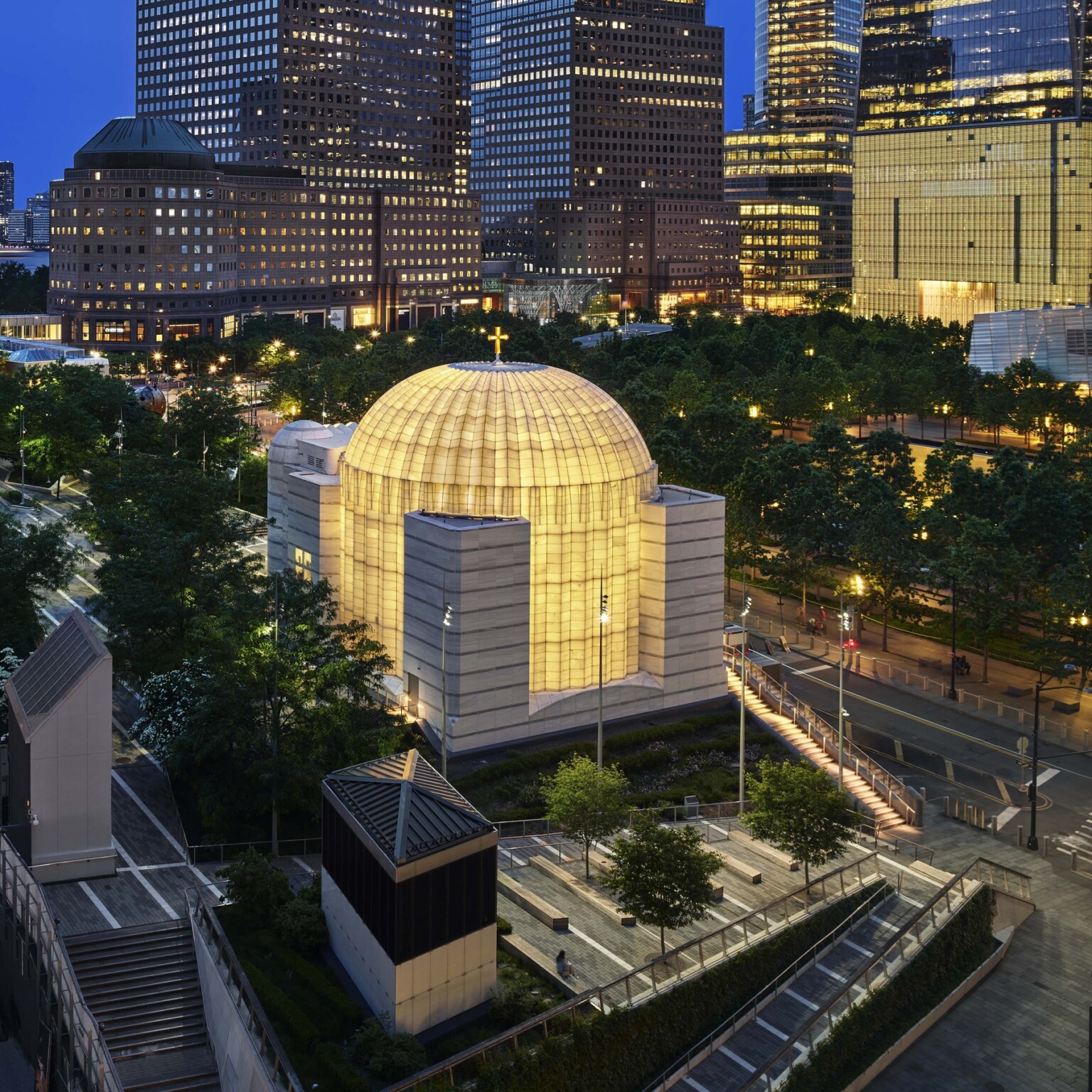 Exterior of the Saint Nicholas Greek Orthodox Church in New York City featuring the ambient glow of light Exterior of the Saint Nicholas Greek Orthodox Church in New York City featuring the ambient glow of light