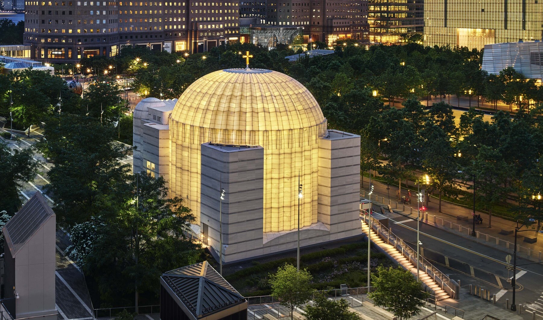 Exterior of the Saint Nicholas Greek Orthodox Church in New York City featuring the ambient glow of light