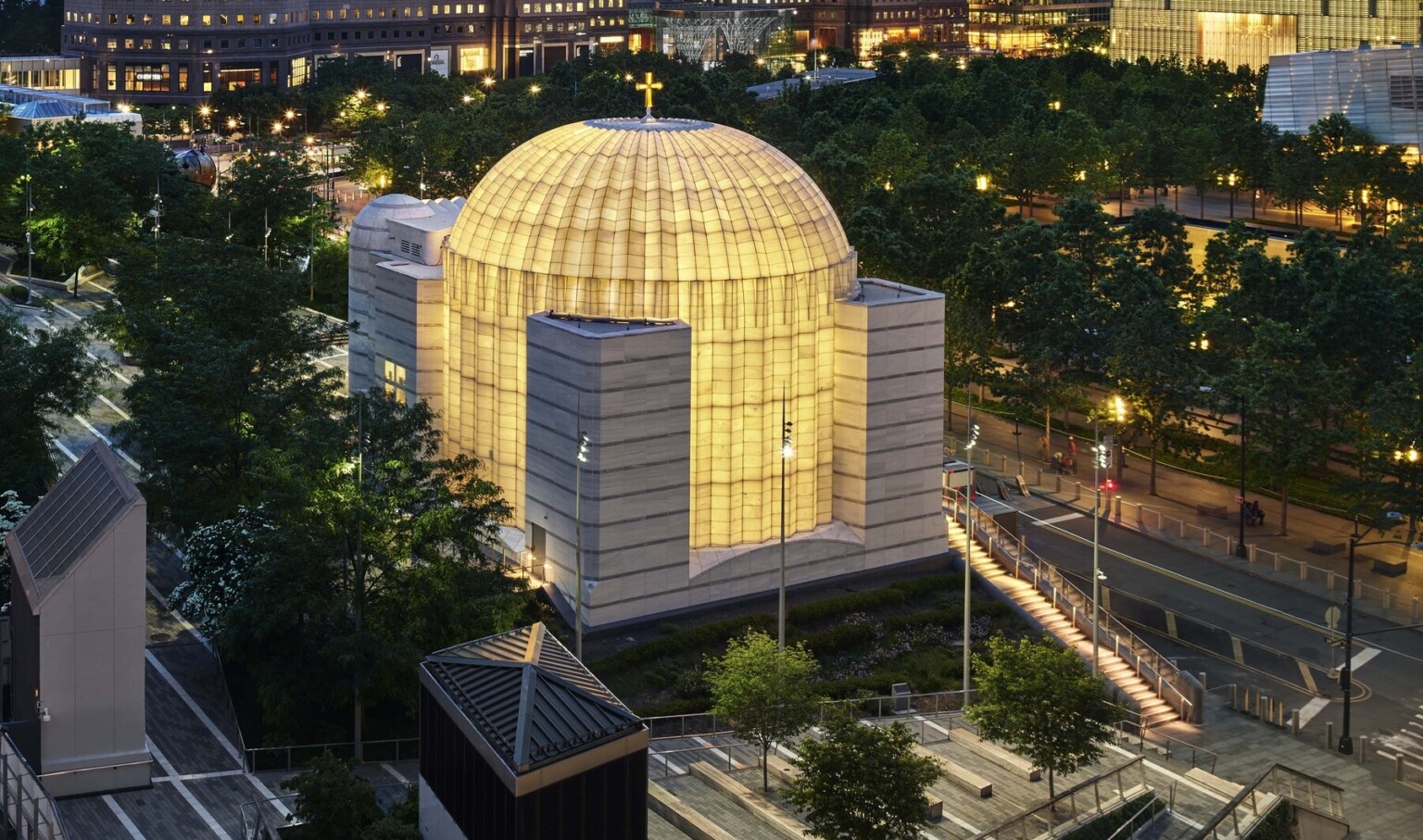 Exterior of the Saint Nicholas Greek Orthodox Church in New York City featuring the ambient glow of light
