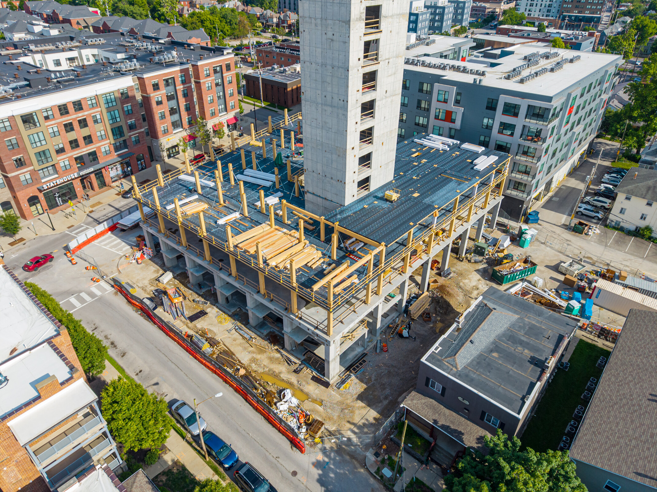 Aerial view of the 9th and High construction site showing the third floor of mass timber beams and columns installed above the podium level.