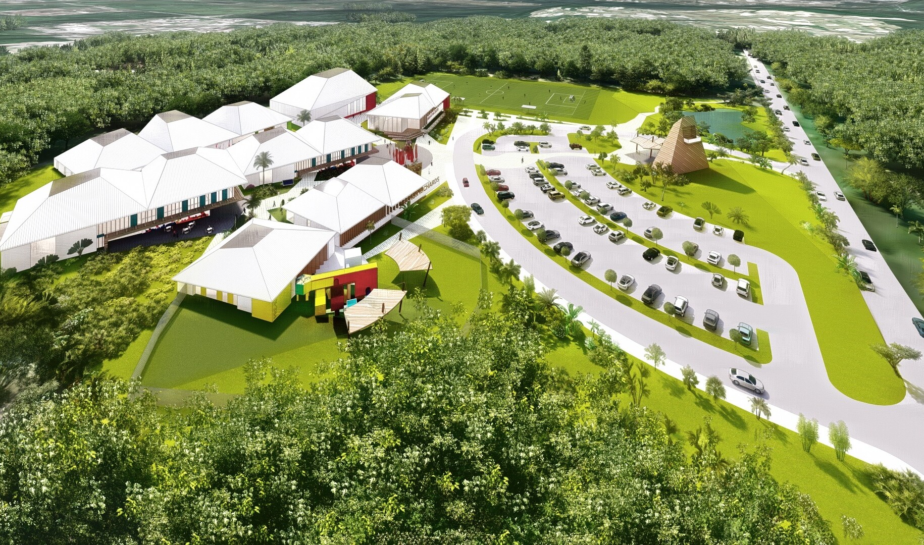 aerial view of an architectural rendering of a tropical school campus surrounded by fields and canopy