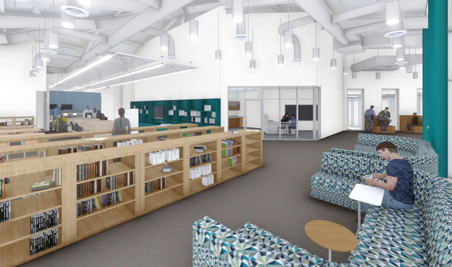 Multicolor U shaped couches in white library with half height wood bookshelves. Green shelf, left of glass walled room
