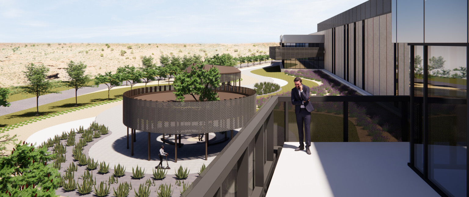 design rendering of man talking on mobile phone on second-floor terrace, tree-lined commons and pathway to entrance, succulents, grass, man on scooter below, surrounding hills, and blue sky, data center design