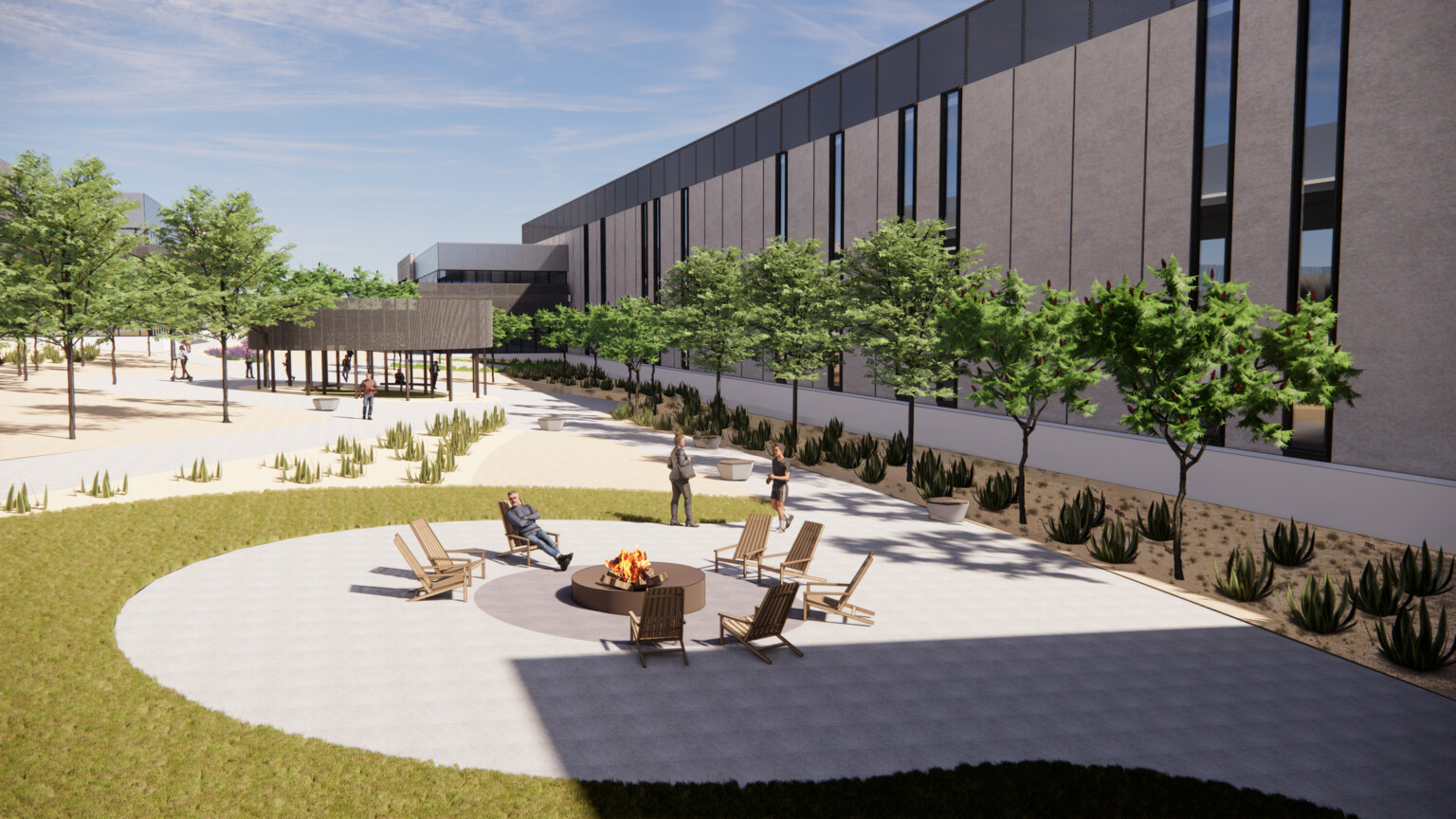 Outdoor amenities such as a fire pit with seating and walking trail around the exterior of data center building clad in prefabricated, concrete palette with linear window cutouts