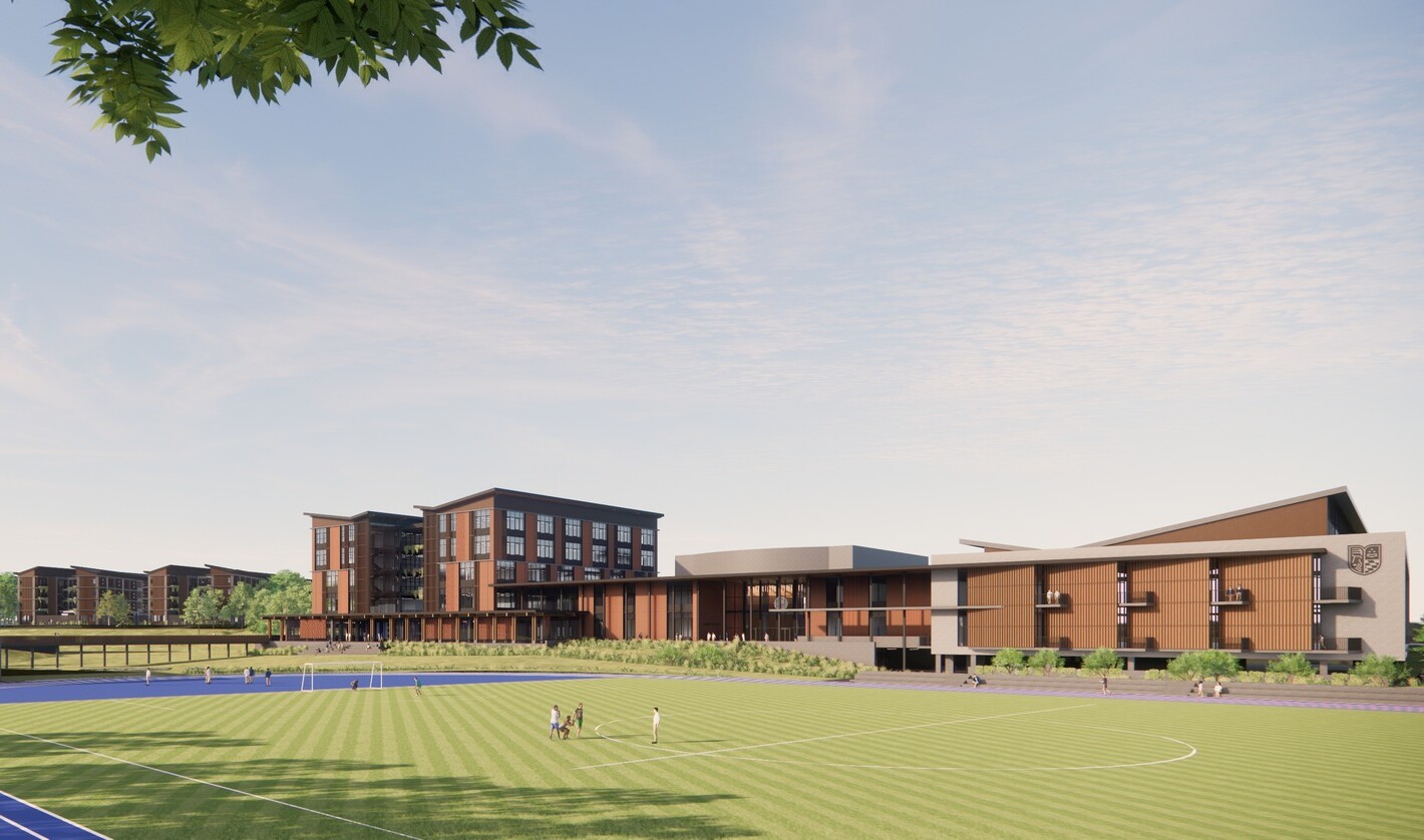 Image featuring a wide angle of the campus with the elite athletics facility in the foreground.
