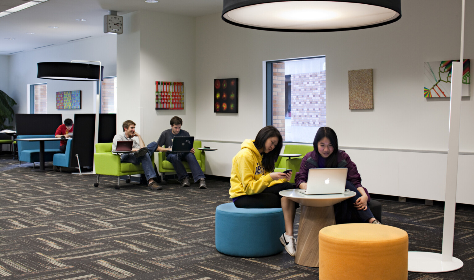 colorful round seating for collaboration in open area at allen research library