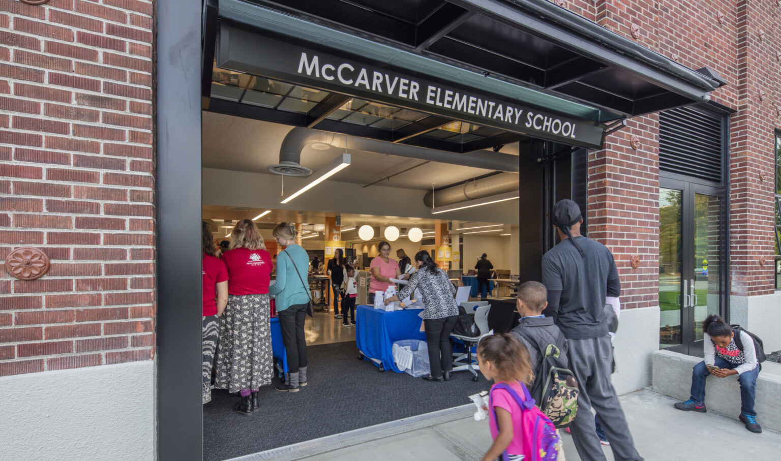 garage door opening up the school to the outdoor area inviting the community to collaborate at the McCarver Elementary School garage door opening up the school to the outdoor area inviting the community to collaborate at the McCarver Elementary School