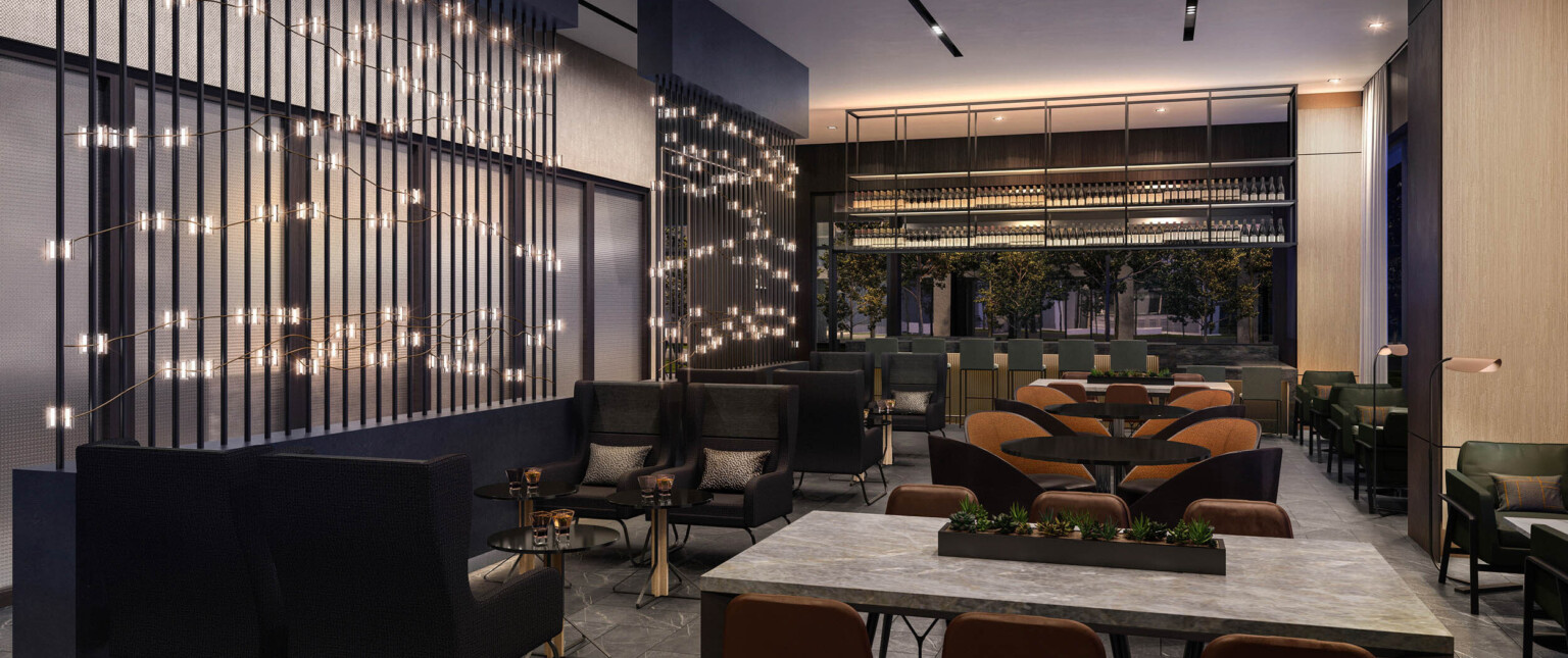 lounge seating and tables next to string light wall sconce lighting following Marriott brand architecture